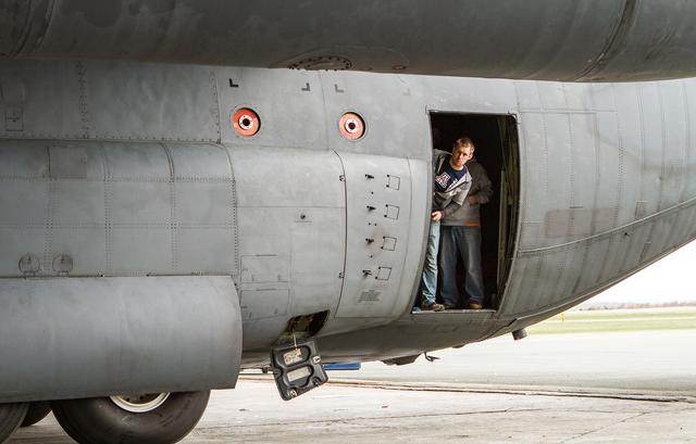 Scientist Ewan Crosbie peeks out of the side aft door of the plane as it slows to a stop in the hangar. Crosbie is an expert on cloud composition.  ---  The <b><a href="http://naames.larc.nasa.gov/" rel="nofollow">North Atlantic Aerosols and Marine Ecosystems Study </a></b> (NAAMES) is a five year investigation to resolve key processes controlling ocean system function, their influences on atmospheric aerosols and clouds and their implications for climate.  Michael Starobin joined the NAAMES field campaign on behalf of Earth Expeditions and NASA Goddard Space Flight Center’s Office of Communications. He presented stories about the important, multi-disciplinary research being conducted by the NAAMES team, with an eye towards future missions on the NASA drawing board. This is a NAAMES photo essay put together by Starobin, a collection of 49 photographs and captions.  Photo and Caption Credit: Michael Starobin   <b><a href="http://www.nasa.gov/audience/formedia/features/MP_Photo_Guidelines.html" rel="nofollow">NASA image use policy</a></b>  <b><a href="http://www.nasa.gov/centers/goddard/home/index.html" rel="nofollow">NASA Goddard Space Flight Center</a></b> enables NASA’s mission through four scientific endeavors: Earth Science, Heliophysics, Solar System Exploration, and Astrophysics. Goddard plays a leading role in NASA’s accomplishments by contributing compelling scientific knowledge to advance the Agency’s mission.  <b>Follow us on <a href="http://twitter.com/NASAGoddardPix" rel="nofollow">Twitter</a></b>  <b>Like us on <a href="http://www.facebook.com/pages/Greenbelt-MD/NASA-Goddard/395013845897?ref=tsd" rel="nofollow">Facebook</a></b>  <b>Find us on <a href="https://www.instagram.com/nasagoddard/?hl=en" rel="nofollow">Instagram</a></b> 
