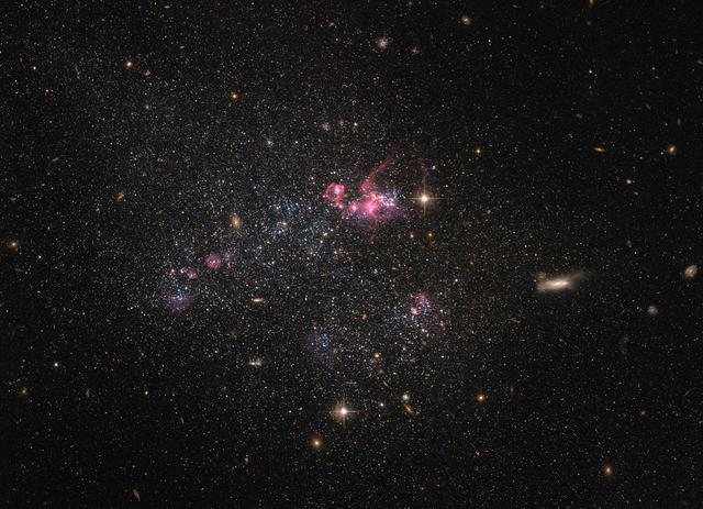 NASA image: Hubble Peers at a Distinctly Disorganized Dwarf Galaxy