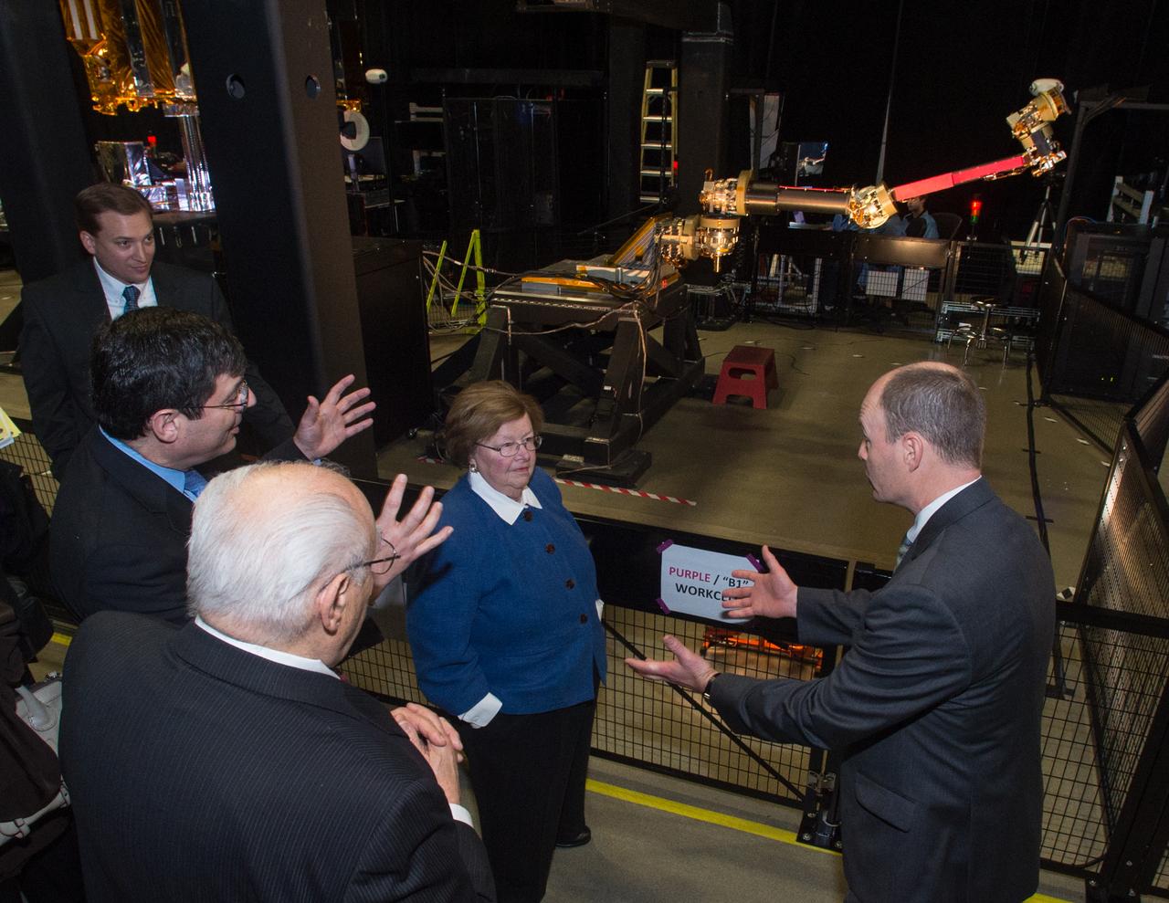 Sen. Barbara Mikulski participated in a ribbon cutting at NASA’s Goddard Space Flight Center on January 6th, 2016, to officially open the new Robotic Operations Center (ROC) developed by the Satellite Servicing Capabilities Office. Within the ROC's black walls, NASA is testing technologies and operational procedures for science and exploration missions, including the Restore-L satellite servicing mission and also the Asteroid Redirect Mission.   During her tour of the ROC, Sen. Mikulski saw first-hand an early version of the NASA Servicing Arm (visible at top right), a 2-meter-class robot with the dexterity to grasp and refuel a satellite on orbit.   She also heard a description of Raven, a payload launching to the International Space Station that will demonstrate real-time, relative space navigation technology.  The robotic technologies that NASA is developing within the ROC also support the Journey to Mars.  Learn more about NASA’s satellite servicing technologies at <a href="http://ssco.gsfc.nasa.gov/" rel="nofollow">ssco.gsfc.nasa.gov/</a>.  Image credit: NASA/Bill Hrybyk  Read more: <a href="http://www.nasa.gov/feature/goddard/2016/maryland-sen-barbara-mikulski-visits-nasa-goddard" rel="nofollow">www.nasa.gov/feature/goddard/2016/maryland-sen-barbara-mi...</a>  <b><a href="http://www.nasa.gov/audience/formedia/features/MP_Photo_Guidelines.html" rel="nofollow">NASA image use policy.</a></b>  <b><a href="http://www.nasa.gov/centers/goddard/home/index.html" rel="nofollow">NASA Goddard Space Flight Center</a></b> enables NASA’s mission through four scientific endeavors: Earth Science, Heliophysics, Solar System Exploration, and Astrophysics. Goddard plays a leading role in NASA’s accomplishments by contributing compelling scientific knowledge to advance the Agency’s mission.  <b>Follow us on <a href="http://twitter.com/NASAGoddardPix" rel="nofollow">Twitter</a></b>  <b>Like us on <a href="http://www.facebook.com/pages/Greenbelt-MD/NASA-Goddard/395013845897?ref=tsd" rel="nofollow">Facebook</a></b>  <b>Find us on <a href="http://instagrid.me/nasagoddard/?vm=grid" rel="nofollow">Instagram</a></b>