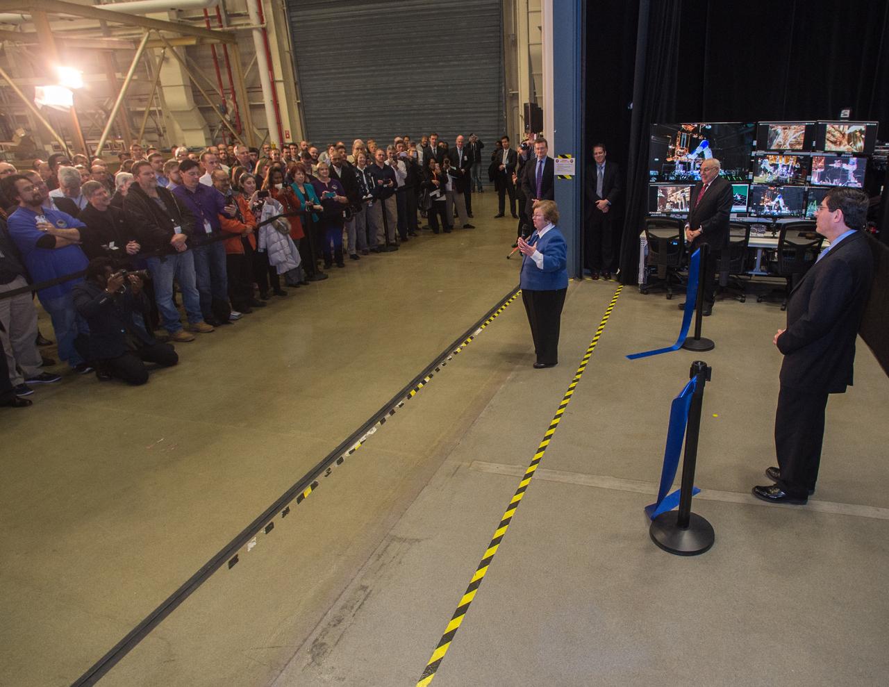 Sen. Barbara Mikulski participated in a ribbon cutting at NASA’s Goddard Space Flight Center on January 6th, 2016, to officially open the new Robotic Operations Center (ROC) developed by the Satellite Servicing Capabilities Office. Within the ROC's black walls, NASA is testing technologies and operational procedures for science and exploration missions, including the Restore-L satellite servicing mission and also the Asteroid Redirect Mission.   During her tour of the ROC, Sen. Mikulski saw first-hand an early version of the NASA Servicing Arm, a 2-meter-class robot with the dexterity to grasp and refuel a satellite on orbit. She also heard a description of Raven, a payload launching to the International Space Station that will demonstrate real-time, relative space navigation technology.  The robotic technologies that NASA is developing within the ROC also support the Journey to Mars.  Learn more about NASA’s satellite servicing technologies at <a href="http://ssco.gsfc.nasa.gov/" rel="nofollow">ssco.gsfc.nasa.gov/</a>.  Image credit: NASA/Bill Hrybyk   Read more: <a href="http://www.nasa.gov/feature/goddard/2016/maryland-sen-barbara-mikulski-visits-nasa-goddard" rel="nofollow">www.nasa.gov/feature/goddard/2016/maryland-sen-barbara-mi...</a>  <b><a href="http://www.nasa.gov/audience/formedia/features/MP_Photo_Guidelines.html" rel="nofollow">NASA image use policy.</a></b>  <b><a href="http://www.nasa.gov/centers/goddard/home/index.html" rel="nofollow">NASA Goddard Space Flight Center</a></b> enables NASA’s mission through four scientific endeavors: Earth Science, Heliophysics, Solar System Exploration, and Astrophysics. Goddard plays a leading role in NASA’s accomplishments by contributing compelling scientific knowledge to advance the Agency’s mission.  <b>Follow us on <a href="http://twitter.com/NASAGoddardPix" rel="nofollow">Twitter</a></b>  <b>Like us on <a href="http://www.facebook.com/pages/Greenbelt-MD/NASA-Goddard/395013845897?ref=tsd" rel="nofollow">Facebook</a></b>  <b>Find us on <a href="http://instagrid.me/nasagoddard/?vm=grid" rel="nofollow">Instagram</a></b>