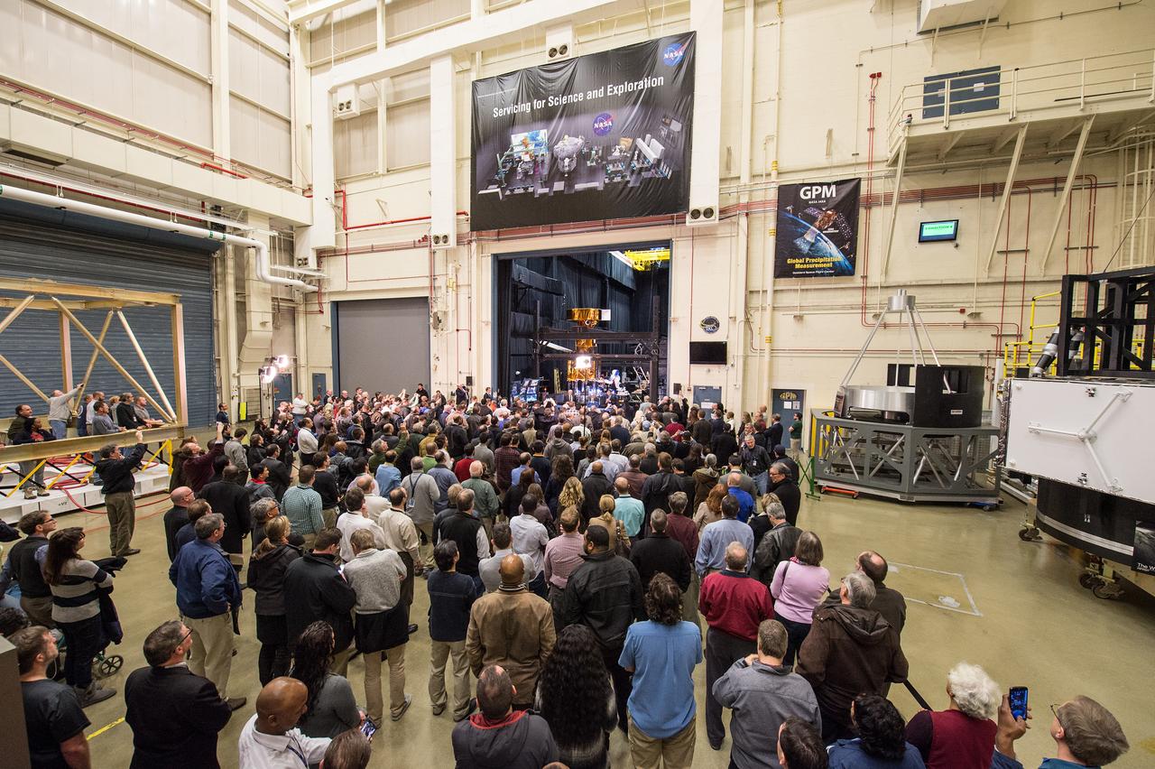Sen. Barbara Mikulski participated in a ribbon cutting at NASA’s Goddard Space Flight Center on January 6th, 2016, to officially open the new Robotic Operations Center (ROC) developed by the Satellite Servicing Capabilities Office. Within the ROC's black walls, NASA is testing technologies and operational procedures for science and exploration missions, including the Restore-L satellite servicing mission and also the Asteroid Redirect Mission.  In this image, a gathering of Goddard employees watch the ribbon cutting.  During her tour of the ROC, Sen. Mikulski saw first-hand an early version of the NASA Servicing Arm, a 2-meter-class robot with the dexterity to grasp and refuel a satellite on orbit. She also heard a description of Raven, a payload launching to the International Space Station that will demonstrate real-time, relative space navigation technology.  The robotic technologies that NASA is developing within the ROC also support the Journey to Mars.  Learn more about NASA’s satellite servicing technologies at <a href="http://ssco.gsfc.nasa.gov/" rel="nofollow">ssco.gsfc.nasa.gov/</a>.  Image credit: NASA/Desiree Stover  Read more: <a href="http://www.nasa.gov/feature/goddard/2016/maryland-sen-barbara-mikulski-visits-nasa-goddard" rel="nofollow">www.nasa.gov/feature/goddard/2016/maryland-sen-barbara-mi...</a>  <b><a href="http://www.nasa.gov/audience/formedia/features/MP_Photo_Guidelines.html" rel="nofollow">NASA image use policy.</a></b>  <b><a href="http://www.nasa.gov/centers/goddard/home/index.html" rel="nofollow">NASA Goddard Space Flight Center</a></b> enables NASA’s mission through four scientific endeavors: Earth Science, Heliophysics, Solar System Exploration, and Astrophysics. Goddard plays a leading role in NASA’s accomplishments by contributing compelling scientific knowledge to advance the Agency’s mission.  <b>Follow us on <a href="http://twitter.com/NASAGoddardPix" rel="nofollow">Twitter</a></b>  <b>Like us on <a href="http://www.facebook.com/pages/Greenbelt-MD/NASA-Goddard/395013845897?ref=tsd" rel="nofollow">Facebook</a></b>  <b>Find us on <a href="http://instagrid.me/nasagoddard/?vm=grid" rel="nofollow">Instagram</a></b>