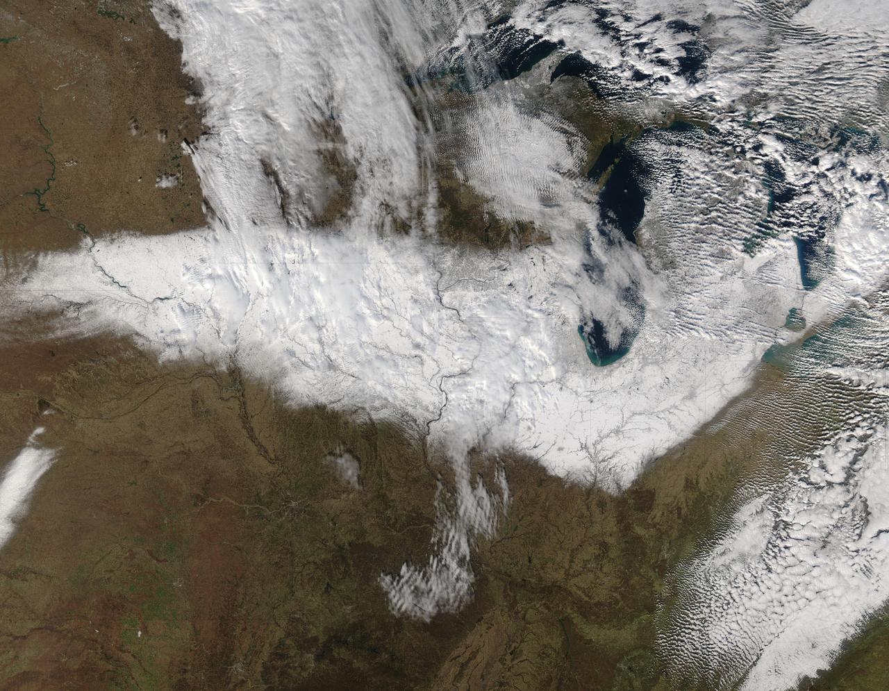 On Nov. 22, 2015 at 19:15 UTC the MODIS instrument aboard NASA's Aqua satellite captured this image of Snow across the Midwest.  Credit: NASA Goddard MODIS Rapid Response Team  NASA image use policy.  NASA Goddard Space Flight Center enables NASA’s mission through four scientific endeavors: Earth Science, Heliophysics, Solar System Exploration, and Astrophysics. Goddard plays a leading role in NASA’s accomplishments by contributing compelling scientific knowledge to advance the Agency’s mission.  Follow us on Twitter  Like us on Facebook  Find us on Instagram