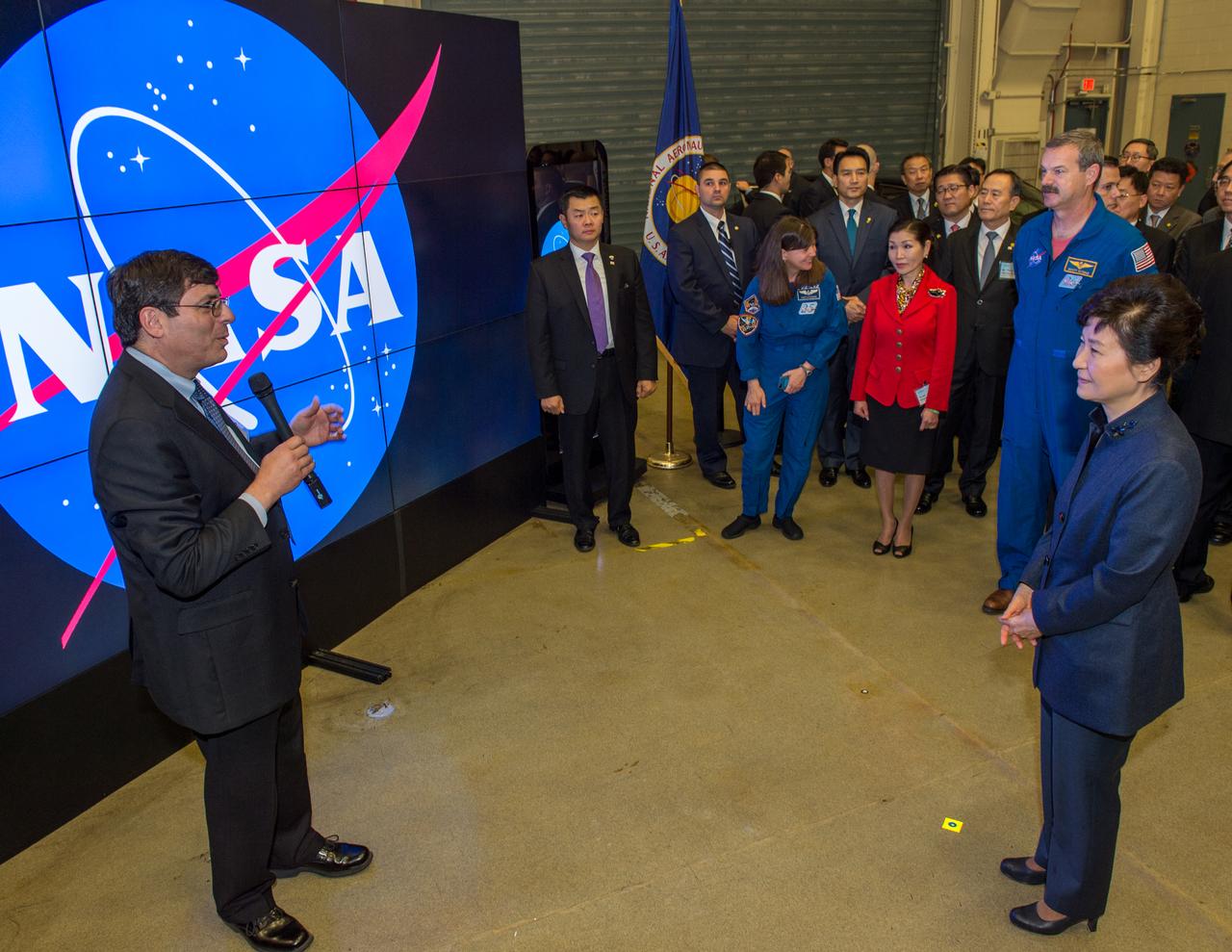 As part of her visit to the United States, President Park Geun-hye of South Korea visited NASA’s Goddard Space Flight Center in Greenbelt, Md. On Oct. 14, 2015. The visit offered an opportunity to celebrate past collaborative efforts between the American and South Korean space programs along with presentations on current projects and programs underway at Goddard.  Caption: Goddard's Director Christopher Scolese welcomes President Park Geun-hye of South Korea and other Korean visitors to NASA Goddard on Oct. 14, 2015. Madam Park’s visit to Goddard offered an opportunity to celebrate past collaborative efforts between the American and South Korean space programs along with presentations on current projects and programs underway at Goddard.  Credit: NASA/Goddard/Bill Hrybyk  <b><a href="http://www.nasa.gov/audience/formedia/features/MP_Photo_Guidelines.html" rel="nofollow">NASA image use policy.</a></b>  <b><a href="http://www.nasa.gov/centers/goddard/home/index.html" rel="nofollow">NASA Goddard Space Flight Center</a></b> enables NASA’s mission through four scientific endeavors: Earth Science, Heliophysics, Solar System Exploration, and Astrophysics. Goddard plays a leading role in NASA’s accomplishments by contributing compelling scientific knowledge to advance the Agency’s mission.  <b>Follow us on <a href="http://twitter.com/NASAGoddardPix" rel="nofollow">Twitter</a></b>  <b>Like us on <a href="http://www.facebook.com/pages/Greenbelt-MD/NASA-Goddard/395013845897?ref=tsd" rel="nofollow">Facebook</a></b>  <b>Find us on <a href="http://instagrid.me/nasagoddard/?vm=grid" rel="nofollow">Instagram</a></b>   