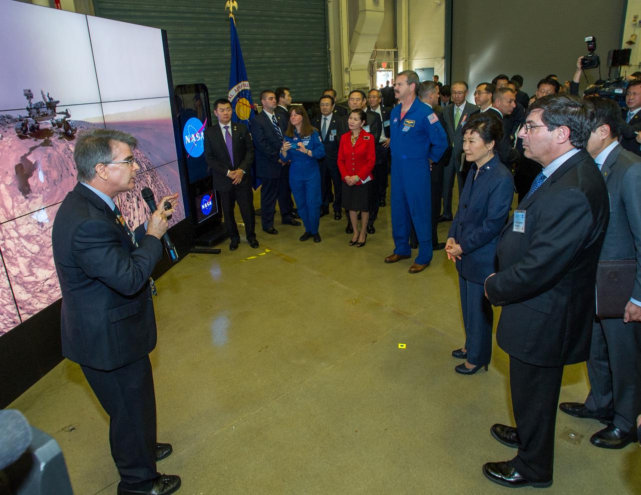 Caption: Dr. James Garvin, Chief Scientist present space exploration findings on a mobile hyperwall display to President Park Geun-hye of South Korea. Madam Park’s visit to Goddard offered an opportunity to celebrate past collaborative efforts between the American and South Korean space programs along with presentations on current projects and programs underway at Goddard.  Credit: NASA/Goddard/Bill Hrybyk  <b><a href="http://www.nasa.gov/audience/formedia/features/MP_Photo_Guidelines.html" rel="nofollow">NASA image use policy.</a></b>  <b><a href="http://www.nasa.gov/centers/goddard/home/index.html" rel="nofollow">NASA Goddard Space Flight Center</a></b> enables NASA’s mission through four scientific endeavors: Earth Science, Heliophysics, Solar System Exploration, and Astrophysics. Goddard plays a leading role in NASA’s accomplishments by contributing compelling scientific knowledge to advance the Agency’s mission.  <b>Follow us on <a href="http://twitter.com/NASAGoddardPix" rel="nofollow">Twitter</a></b>  <b>Like us on <a href="http://www.facebook.com/pages/Greenbelt-MD/NASA-Goddard/395013845897?ref=tsd" rel="nofollow">Facebook</a></b>  <b>Find us on <a href="http://instagrid.me/nasagoddard/?vm=grid" rel="nofollow">Instagram</a></b>   