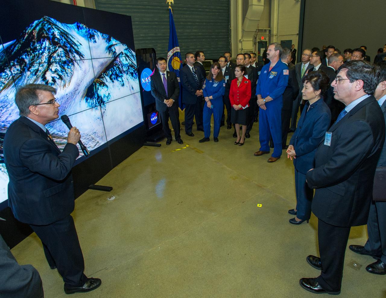Caption: Dr. James Garvin, Chief Scientist present space exploration findings on a mobile hyperwall display to President Park Geun-hye of South Korea. Madam Park’s visit to Goddard offered an opportunity to celebrate past collaborative efforts between the American and South Korean space programs along with presentations on current projects and programs underway at Goddard.  Credit: NASA/Goddard/Bill Hrybyk  <b><a href="http://www.nasa.gov/audience/formedia/features/MP_Photo_Guidelines.html" rel="nofollow">NASA image use policy.</a></b>  <b><a href="http://www.nasa.gov/centers/goddard/home/index.html" rel="nofollow">NASA Goddard Space Flight Center</a></b> enables NASA’s mission through four scientific endeavors: Earth Science, Heliophysics, Solar System Exploration, and Astrophysics. Goddard plays a leading role in NASA’s accomplishments by contributing compelling scientific knowledge to advance the Agency’s mission.  <b>Follow us on <a href="http://twitter.com/NASAGoddardPix" rel="nofollow">Twitter</a></b>  <b>Like us on <a href="http://www.facebook.com/pages/Greenbelt-MD/NASA-Goddard/395013845897?ref=tsd" rel="nofollow">Facebook</a></b>  <b>Find us on <a href="http://instagrid.me/nasagoddard/?vm=grid" rel="nofollow">Instagram</a></b>   
