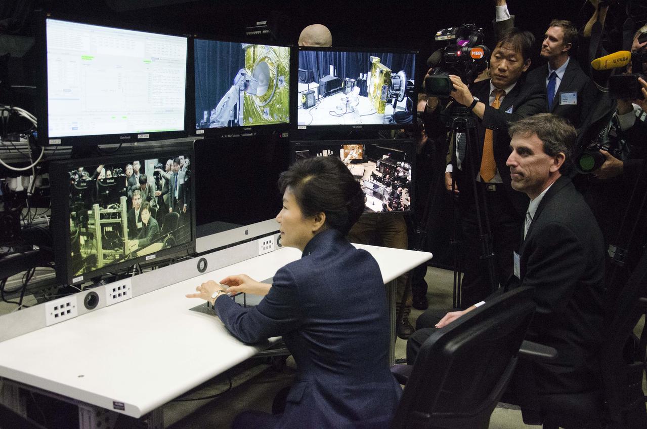 Caption: President Park Geun-hye of South Korea operates a robotic arm as Brian Roberts, Robotic Operations Manager at NASA Goddard describes the operations that take place in the Satellite Servicing Capabilities Office’s robotic lab.  GODDARD VISIT BY SOUTH KOREAN PRESIDENT – 14-OCT-2015 As part of her visit to the United States, President Park Geun-hye of South Korea visited NASA’s Goddard Space Flight Center in Greenbelt, Md. On Oct. 14, 2015. The visit offered an opportunity to celebrate past collaborative efforts between the American and South Korean space programs along with presentations on current projects and programs underway at Goddard.  Credit: NASA/Goddard/Rebecca Roth  <b><a href="http://www.nasa.gov/audience/formedia/features/MP_Photo_Guidelines.html" rel="nofollow">NASA image use policy.</a></b>  <b><a href="http://www.nasa.gov/centers/goddard/home/index.html" rel="nofollow">NASA Goddard Space Flight Center</a></b> enables NASA’s mission through four scientific endeavors: Earth Science, Heliophysics, Solar System Exploration, and Astrophysics. Goddard plays a leading role in NASA’s accomplishments by contributing compelling scientific knowledge to advance the Agency’s mission.  <b>Follow us on <a href="http://twitter.com/NASAGoddardPix" rel="nofollow">Twitter</a></b>  <b>Like us on <a href="http://www.facebook.com/pages/Greenbelt-MD/NASA-Goddard/395013845897?ref=tsd" rel="nofollow">Facebook</a></b>  <b>Find us on <a href="http://instagrid.me/nasagoddard/?vm=grid" rel="nofollow">Instagram</a></b>  