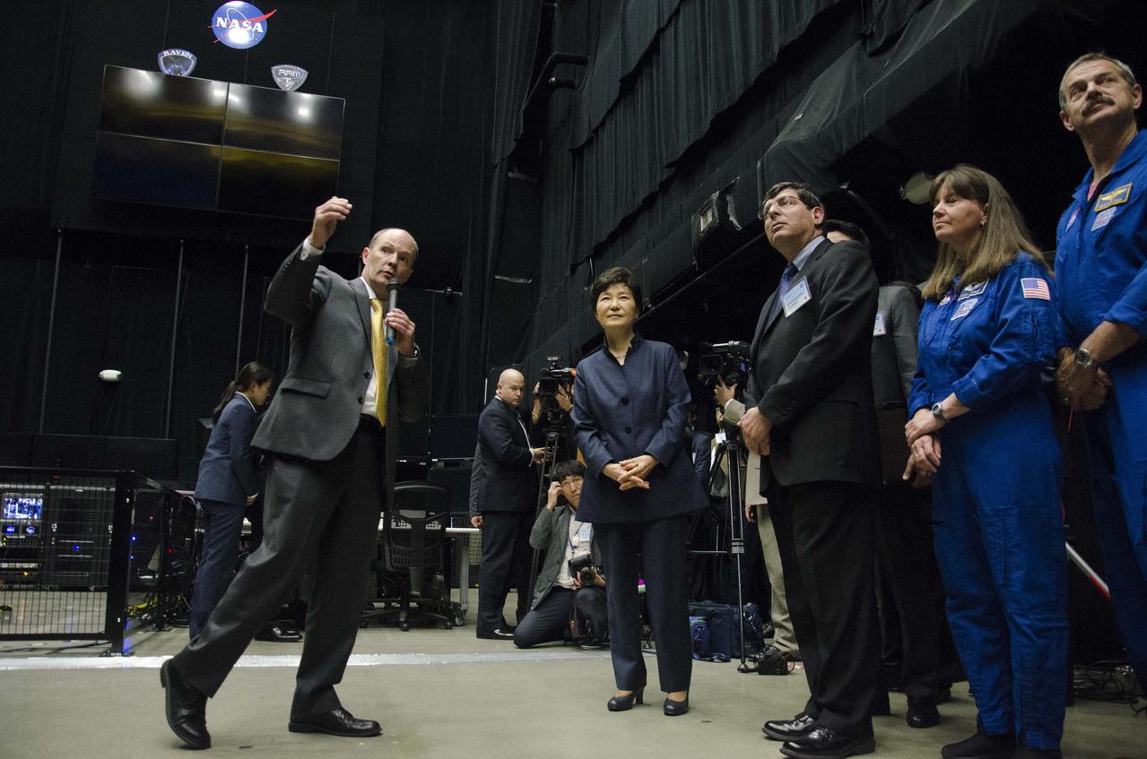 Caption: Benjamin Reed gives brief overview of NASA Goddard’s Satellite Servicing Capabilities Office to President Park Geun-hye of South Korea and (left to right) Goddard Center Director Christopher Scolese, NASA Astronauts Cady Coleman and Scott Altman.  As part of her visit to the United States, President Park Geun-hye of South Korea visited NASA’s Goddard Space Flight Center in Greenbelt, Md. On Oct. 14, 2015. The visit offered an opportunity to celebrate past collaborative efforts between the American and South Korean space programs along with presentations on current projects and programs underway at Goddard.  Credit: NASA/Goddard/Rebecca Roth  <b><a href="http://www.nasa.gov/audience/formedia/features/MP_Photo_Guidelines.html" rel="nofollow">NASA image use policy.</a></b>  <b><a href="http://www.nasa.gov/centers/goddard/home/index.html" rel="nofollow">NASA Goddard Space Flight Center</a></b> enables NASA’s mission through four scientific endeavors: Earth Science, Heliophysics, Solar System Exploration, and Astrophysics. Goddard plays a leading role in NASA’s accomplishments by contributing compelling scientific knowledge to advance the Agency’s mission.  <b>Follow us on <a href="http://twitter.com/NASAGoddardPix" rel="nofollow">Twitter</a></b>  <b>Like us on <a href="http://www.facebook.com/pages/Greenbelt-MD/NASA-Goddard/395013845897?ref=tsd" rel="nofollow">Facebook</a></b>  <b>Find us on <a href="http://instagrid.me/nasagoddard/?vm=grid" rel="nofollow">Instagram</a></b>  