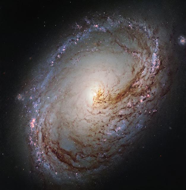 NASA image: Hubble Peers into the Heart of a Galactic Maelstrom