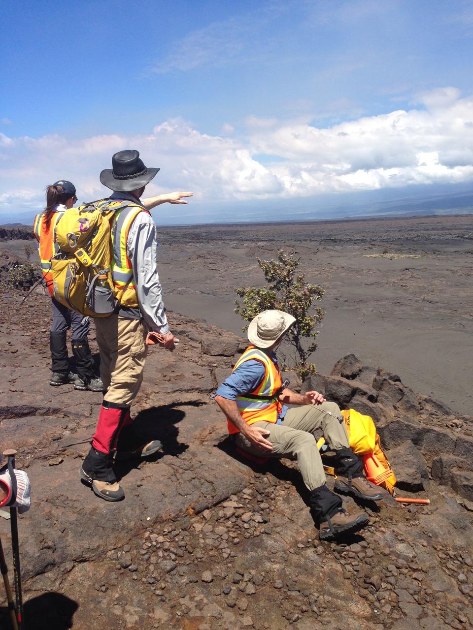 Briefing   Hiking a lava field demands good preparation. Here, the team leaders brief the crew, scientists and student journalists on the route they’ll take down a scarp to the site of Kilauea’s December 1974 eruption.  Credit: NASA/GSFC/Lora Bleacher   In June, five student journalists from Stony Brook University  packed their hiking boots and hydration packs and joined a NASA-funded science team for 10 days on the lava fields of Kilauea, an active Hawaiian volcano. Kilauea’s lava fields are an ideal place to test equipment designed for use on Earth’s moon or Mars, because volcanic activity shaped so much of those terrains. The trip was part of an interdisciplinary program called RIS4E – short for Remote, In Situ, and Synchrotron Studies for Science and Exploration – which is designed to prepare for future exploration of the moon, near-Earth asteroids and the moons of Mars.   To read reports from the RIS4E journalism students about their experiences in Hawaii, visit <a href="http://ReportingRIS4E.com" rel="nofollow">ReportingRIS4E.com</a>  <b><a href="http://www.nasa.gov/audience/formedia/features/MP_Photo_Guidelines.html" rel="nofollow">NASA image use policy.</a></b>  <b><a href="http://www.nasa.gov/centers/goddard/home/index.html" rel="nofollow">NASA Goddard Space Flight Center</a></b> enables NASA’s mission through four scientific endeavors: Earth Science, Heliophysics, Solar System Exploration, and Astrophysics. Goddard plays a leading role in NASA’s accomplishments by contributing compelling scientific knowledge to advance the Agency’s mission.  <b>Follow us on <a href="http://twitter.com/NASAGoddardPix" rel="nofollow">Twitter</a></b>  <b>Like us on <a href="http://www.facebook.com/pages/Greenbelt-MD/NASA-Goddard/395013845897?ref=tsd" rel="nofollow">Facebook</a></b>  <b>Find us on <a href="http://instagrid.me/nasagoddard/?vm=grid" rel="nofollow">Instagram</a></b> 