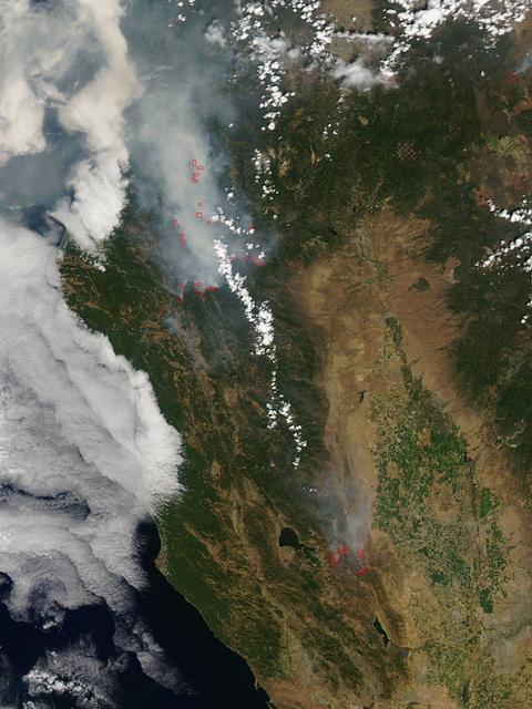 California has been hit hard the past few weeks with storms. Storms bring lightning and lightning strikes cause wildfires. Currently there are at least five fire complexes in the area including River, Fork, South, Route and Mad River. The Mad River complex is a series of seven lightning fires that started on July 30th, 2015 after a lightning storm moved through Northern California. After initial firefighters responded, 25 fires were reported and most of the fires were contained. Some additional fires might be detected from the original lightning storms in the upcoming days and will be attacked once they are found. Damage assessment is ongoing and crews will determine the extent of structures and equipment damaged or destroyed. The River Complex is managing a total of 5 fires due to fires merging together on the Shasta-Trinity and the Six Rivers National Forests. Winds from the west are expected to lift the inversion today resulting in active fire behavior. The Fork Complex consists of over 40 fires, all of which were ignited by lightning between July 29 and 31, 2015. These fires are still being identified, assessed, and prioritized. Updated acreage and information about specific fires will be published as it is known. Fire activity moderated throughout last night (8/4) with the smoke inversion layer remaining in place today. Hopefully this will create favorable conditions for fire crews to take direct fire attack on the fires edge, construct dozer line and scout for best firefighting locations on all fires in the complex. The South Complex consists of approximately nine known fires, five of which are currently over 100 acres. The fires are active and defense of structures and point protection are in progress. The weather is trapping smoke in the valley causing very poor air quality. As the smoke lifts the fire activity increases. Firefighters will continue to provide point protection on structures and to look for opportunities to build direct and indirect containment lines. The Route Complex currently stands at 12,164 acres from seven separate fires and is at 2% containment. The overall acreage has been reduced because the South Fire on the nearby South Complex is merging with the Johnson Fire in the Route Complex resulting in decreased and revised fire perimeter acreage. This natural-color satellite image collected by the Moderate Resolution Imaging Spectroradiometer (MODIS) aboard the Terra satellite shows smoke rising and drifting northwest from the various fire complexes. It was captured on August 04, 2015. Actively burning areas, detected by MODIS’s thermal bands, are outlined in red. NASA image courtesy Jeff Schmaltz, MODIS Rapid Response Team. <b><a href="http://www.nasa.gov/audience/formedia/features/MP_Photo_Guidelines.html" rel="nofollow">NASA image use policy.</a></b> <b><a href="http://www.nasa.gov/centers/goddard/home/index.html" rel="nofollow">NASA Goddard Space Flight Center</a></b> enables NASA’s mission through four scientific endeavors: Earth Science, Heliophysics, Solar System Exploration, and Astrophysics. Goddard plays a leading role in NASA’s accomplishments by contributing compelling scientific knowledge to advance the Agency’s mission. <b>Follow us on <a href="http://twitter.com/NASAGoddardPix" rel="nofollow">Twitter</a></b> <b>Like us on <a href="http://www.facebook.com/pages/Greenbelt-MD/NASA-Goddard/395013845897?ref=tsd" rel="nofollow">Facebook</a></b> <b>Find us on <a href="http://instagrid.me/nasagoddard/?vm=grid" rel="nofollow">Instagram</a></b>