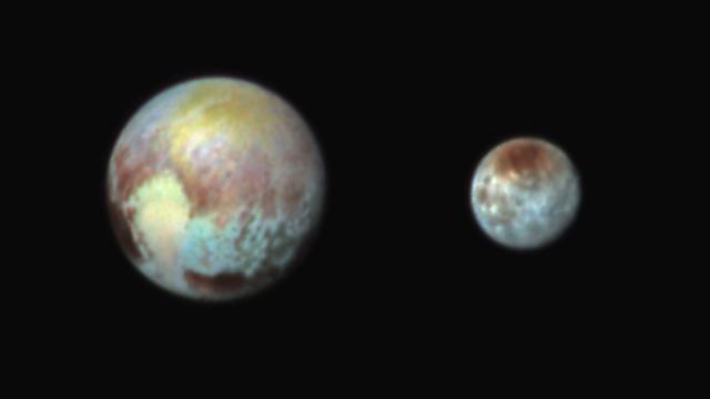 NASA image: Pluto and it's moon Charon Shine in False Color