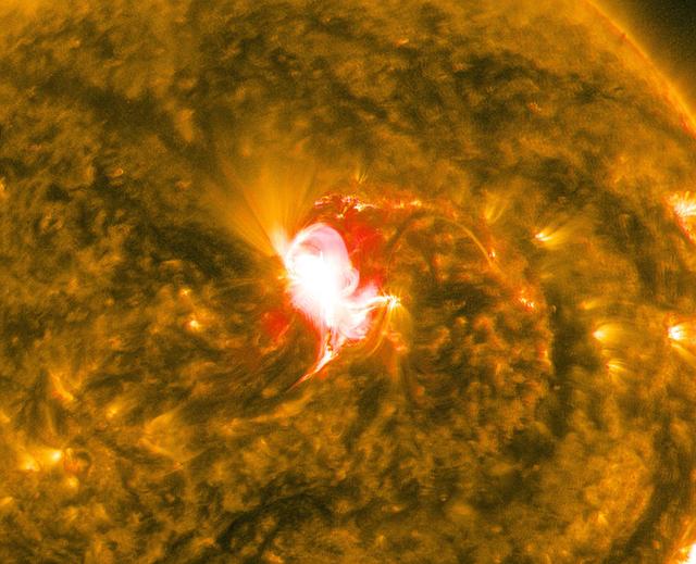 NASA image: Sun Unleashes Mid-level Flare