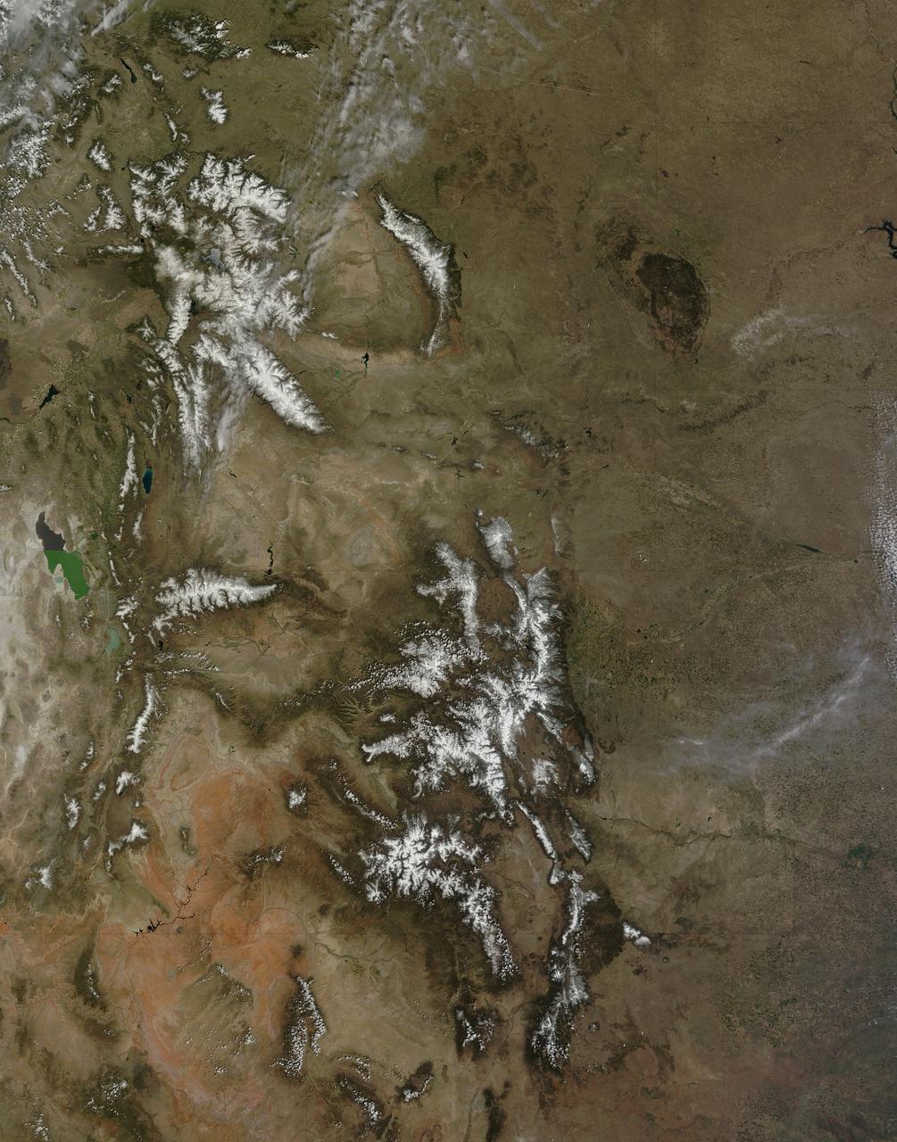 On April 29, 2015 the Moderate Resolution Imaging Spectroradiometer (MODIS) aboard NASA’s Terra satellite captured a true-color image of a typical spring scene in the western United State: snow-crowned Rocky Mountains rising above the faintly greening plains.  The Rocky Mountains stretch from British Columbia, Canada to the Rio Grande in New Mexico, a span of roughly 3,000 miles, and contains many of the highest peaks in the continental United States. The tallest, Mount Elbert, rises 14,400 ft. (4,401 m) above sea level, and is located in the San Isabel National Forest, near Leadville, Colorado.  This image covers seven Rocky Mountain states. From north to south they are: Montana and Idaho, Wyoming; Utah (with the Great Salt Lake visible) and Colorado; Arizona and New Mexico. To the east, the Great Plain states captured are, from north to south: North Dakota, South Dakota, Nebraska, Kansas, Oklahoma and northwestern Texas.  Credit: NASA/GSFC/Jeff Schmaltz/MODIS Land Rapid Response Team  <b><a href="http://www.nasa.gov/audience/formedia/features/MP_Photo_Guidelines.html" rel="nofollow">NASA image use policy.</a></b>  <b><a href="http://www.nasa.gov/centers/goddard/home/index.html" rel="nofollow">NASA Goddard Space Flight Center</a></b> enables NASA’s mission through four scientific endeavors: Earth Science, Heliophysics, Solar System Exploration, and Astrophysics. Goddard plays a leading role in NASA’s accomplishments by contributing compelling scientific knowledge to advance the Agency’s mission.  <b>Follow us on <a href="http://twitter.com/NASAGoddardPix" rel="nofollow">Twitter</a></b>  <b>Like us on <a href="http://www.facebook.com/pages/Greenbelt-MD/NASA-Goddard/395013845897?ref=tsd" rel="nofollow">Facebook</a></b>  <b>Find us on <a href="http://instagrid.me/nasagoddard/?vm=grid" rel="nofollow">Instagram</a></b>