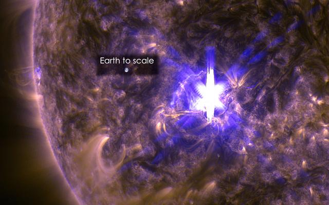 The sun emitted a significant solar flare, peaking at 12:22 p.m. EDT on March 11, 2015. NASA’s Solar Dynamics Observatory, which watches the sun constantly, captured an image of the event. Solar flares are powerful bursts of radiation. Harmful radiation from a flare cannot pass through Earth's atmosphere to physically affect humans on the ground, however -- when intense enough -- they can disturb the atmosphere in the layer where GPS and communications signals travel.    This flare is classified as an X2.2-class flare. X-class denotes the most intense flares, while the number provides more information about its strength. An X2 is twice as intense as an X1, an X3 is three times as intense, etc.   This image was captured by NASA's Solar Dynamics Observatory and shows a blend of light from the 171 and 131 Ångström wavelengths. The Earth is shown to scale.  Credit: NASA/Goddard/SDO   <b><a href="http://www.nasa.gov/audience/formedia/features/MP_Photo_Guidelines.html" rel="nofollow">NASA image use policy.</a></b>  <b><a href="http://www.nasa.gov/centers/goddard/home/index.html" rel="nofollow">NASA Goddard Space Flight Center</a></b> enables NASA’s mission through four scientific endeavors: Earth Science, Heliophysics, Solar System Exploration, and Astrophysics. Goddard plays a leading role in NASA’s accomplishments by contributing compelling scientific knowledge to advance the Agency’s mission. <b>Follow us on <a href="http://twitter.com/NASAGoddardPix" rel="nofollow">Twitter</a></b> <b>Like us on <a href="http://www.facebook.com/pages/Greenbelt-MD/NASA-Goddard/395013845897?ref=tsd" rel="nofollow">Facebook</a></b> <b>Find us on <a href="http://instagram.com/nasagoddard?vm=grid" rel="nofollow">Instagram</a></b>