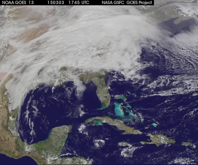 A winter storm was bringing snow, sleet and freezing rain from lower Mississippi Valley to Northeastern U.S. on Thursday, March 5, 2015. A new NASA animation of NOAA's GOES-East satellite imagery showed the progression of the clouds associated with the storm system that triggered winter storm warnings and winter weather advisories from the southern Plains eastward through the Mid-Atlantic and southern New England coast. The system also triggered flood warnings along and to the west of the central Appalachians.  An animation of GOES satellite visible and infrared imagery from March 3 through March 5 showed clouds associated with a cold front push over U.S. East coast. Behind the front, Arctic air is expected to drop low temperatures into the single numbers from Washington, D.C. to Minnesota overnight. Temperatures in the Carolinas and Tennessee are expected to drop to the low 20s.  NOAA's National Weather Service Weather Prediction Center (NWS NPC) in College Park, Maryland noted &quot;a strong cold front moving across the eastern U.S. will bring heavy snow from parts of the Ohio Valley to the Northeast today (March 5) with rain, freezing rain and sleet possible from parts of the lower Mississippi Valley across the Southeast to the southern Mid-Atlantic. Snowfall totals of 5 to 10 inches are possible for some areas. Winter Storm Warnings remain in effect from Texas to Nantucket.&quot;  The animation ends at 17:45 UTC (12:45 p.m. EST). Before the end of the animation, the low pressure center along an arctic frontal boundary was nearly stationary over western North Carolina at 9 a.m. EST on March 5, according to the NWS NPC. NWS radar and surface observations indicated an extended swath of precipitation from near the Texas Gulf Coast through the interior eastern U.S. into southern New England. NPC's storm summary noted at that time &quot;rain was changing to sleet/freezing rain and to all snow along a band within this swath as colder air continues to filter in from the north.  Some areas in Tennessee, the northern mid-Atlantic and southern New England were reporting moderate to heavy snow.&quot;  To create the video and imagery, NASA/NOAA's GOES Project takes the cloud data from NOAA's GOES-East satellite and overlays it on a true-color image of land and ocean created by data from the Moderate Resolution Imaging Spectroradiometer, or MODIS, instrument that flies aboard NASA's Aqua and Terra satellites. Together, those data created the entire picture of the storm and show its movement. After the storm system passes, the snow on the ground becomes visible.    GOES satellites provide the kind of continuous monitoring necessary for intensive data analysis. Geostationary describes an orbit in which a satellite is always in the same position with respect to the rotating Earth. This allows GOES to hover continuously over one position on Earth's surface, appearing stationary.    For updated information about the storm system, visit NOAA's NWS website: <a href="http://www.weather.gov" rel="nofollow">www.weather.gov</a>  For more information about GOES satellites, visit: <a href="http://www.goes.noaa.gov/" rel="nofollow">www.goes.noaa.gov/</a> or goes.gsfc.nasa.gov/  Rob Gutro NASA's Goddard Space Flight Center  <b><a href="http://www.nasa.gov/audience/formedia/features/MP_Photo_Guidelines.html" rel="nofollow">NASA image use policy.</a></b>  <b><a href="http://www.nasa.gov/centers/goddard/home/index.html" rel="nofollow">NASA Goddard Space Flight Center</a></b> enables NASA’s mission through four scientific endeavors: Earth Science, Heliophysics, Solar System Exploration, and Astrophysics. Goddard plays a leading role in NASA’s accomplishments by contributing compelling scientific knowledge to advance the Agency’s mission.  <b>Follow us on <a href="http://twitter.com/NASAGoddardPix" rel="nofollow">Twitter</a></b>  <b>Like us on <a href="http://www.facebook.com/pages/Greenbelt-MD/NASA-Goddard/395013845897?ref=tsd" rel="nofollow">Facebook</a></b>  <b>Find us on <a href="http://instagrid.me/nasagoddard/?vm=grid" rel="nofollow">Instagram</a></b>