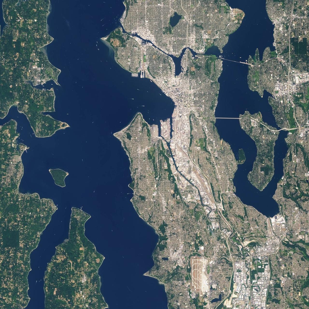 Landsat 7 image of Seattle, Washington acquired August 23, 2014. Landsat 7 is a U.S. satellite used to acquire remotely sensed images of the Earth's land surface and surrounding coastal regions. It is maintained by the Landsat 7 Project Science Office at the NASA Goddard Space Flight Center in Greenbelt, MD. Landsat satellites have been acquiring images of the Earth’s land surface since 1972. Currently there are more than 2 million Landsat images in the National Satellite Land Remote Sensing Data Archive. For more information visit: <a href="http://landsat.usgs.gov/" rel="nofollow">landsat.usgs.gov/</a>..To learn more about the Landsat satellite go to:.<a href="http://landsat.gsfc.nasa.gov/" rel="nofollow">landsat.gsfc.nasa.gov/</a> Credit: NASA/GSFC/Landsat 7 <b><a href="http://www.nasa.gov/audience/formedia/features/MP_Photo_Guidelines.html" rel="nofollow">NASA image use policy.</a></b> <b><a href="http://www.nasa.gov/centers/goddard/home/index.html" rel="nofollow">NASA Goddard Space Flight Center</a></b> enables NASA’s mission through four scientific endeavors: Earth Science, Heliophysics, Solar System Exploration, and Astrophysics. Goddard plays a leading role in NASA’s accomplishments by contributing compelling scientific knowledge to advance the Agency’s mission. <b>Follow us on <a href="http://twitter.com/NASAGoddardPix" rel="nofollow">Twitter</a></b> <b>Like us on <a href="http://www.facebook.com/pages/Greenbelt-MD/NASA-Goddard/395013845897?ref=tsd" rel="nofollow">Facebook</a></b> <b>Find us on <a href="http://instagrid.me/nasagoddard/?vm=grid" rel="nofollow">Instagram</a></b>