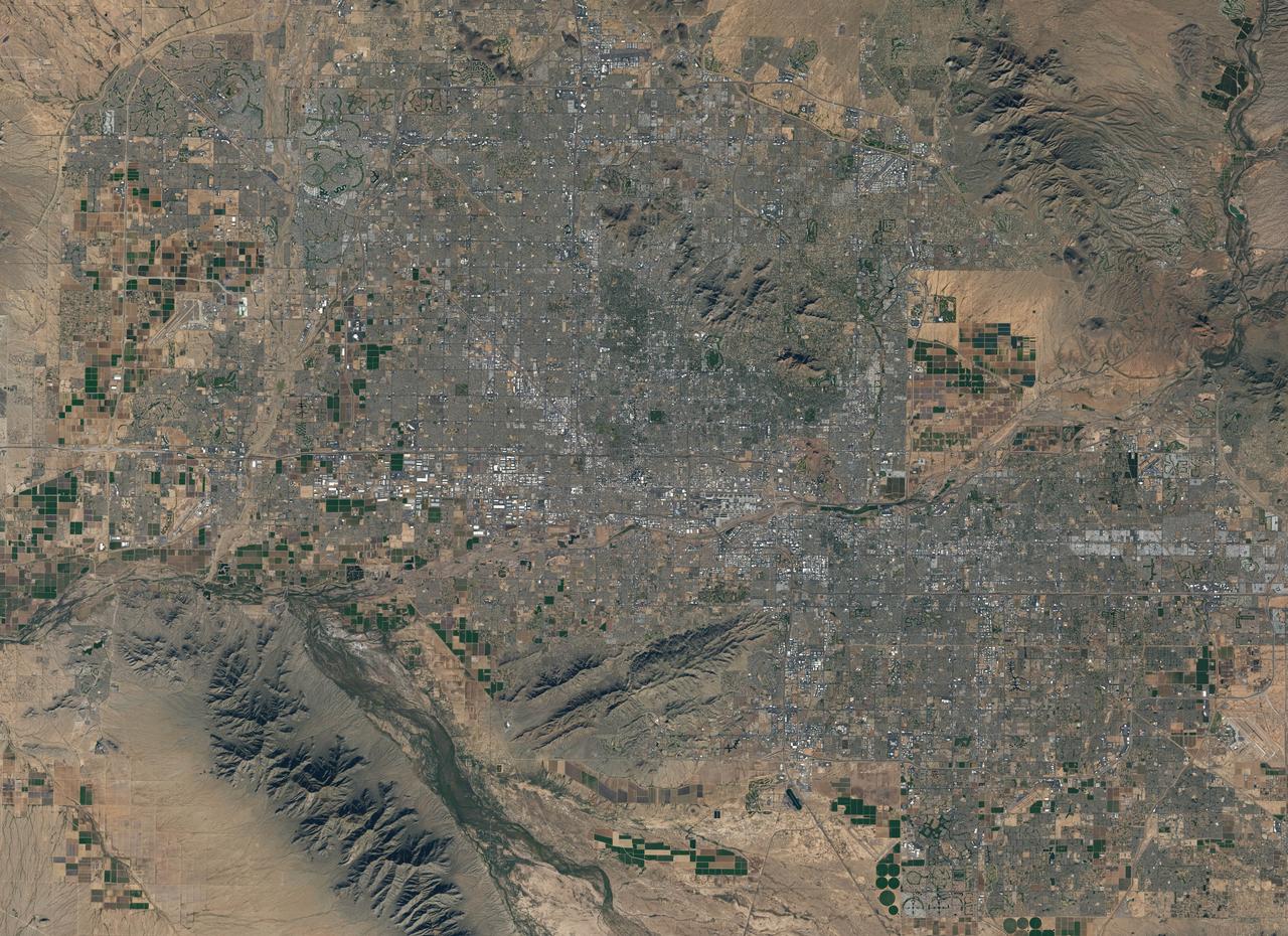 Landsat 7 image of Phoenix, Arizona acquired November 28, 2014. Landsat 7 is a U.S. satellite used to acquire remotely sensed images of the Earth's land surface and surrounding coastal regions. It is maintained by the Landsat 7 Project Science Office at the NASA Goddard Space Flight Center in Greenbelt, MD. Landsat satellites have been acquiring images of the Earth’s land surface since 1972. Currently there are more than 2 million Landsat images in the National Satellite Land Remote Sensing Data Archive. For more information visit: <a href="http://landsat.usgs.gov/" rel="nofollow">landsat.usgs.gov/</a>..To learn more about the Landsat satellite go to:.<a href="http://landsat.gsfc.nasa.gov/" rel="nofollow">landsat.gsfc.nasa.gov/</a> Credit: NASA/GSFC/Landsat 7 <b><a href="http://www.nasa.gov/audience/formedia/features/MP_Photo_Guidelines.html" rel="nofollow">NASA image use policy.</a></b> <b><a href="http://www.nasa.gov/centers/goddard/home/index.html" rel="nofollow">NASA Goddard Space Flight Center</a></b> enables NASA’s mission through four scientific endeavors: Earth Science, Heliophysics, Solar System Exploration, and Astrophysics. Goddard plays a leading role in NASA’s accomplishments by contributing compelling scientific knowledge to advance the Agency’s mission. <b>Follow us on <a href="http://twitter.com/NASAGoddardPix" rel="nofollow">Twitter</a></b> <b>Like us on <a href="http://www.facebook.com/pages/Greenbelt-MD/NASA-Goddard/395013845897?ref=tsd" rel="nofollow">Facebook</a></b> <b>Find us on <a href="http://instagrid.me/nasagoddard/?vm=grid" rel="nofollow">Instagram</a></b>