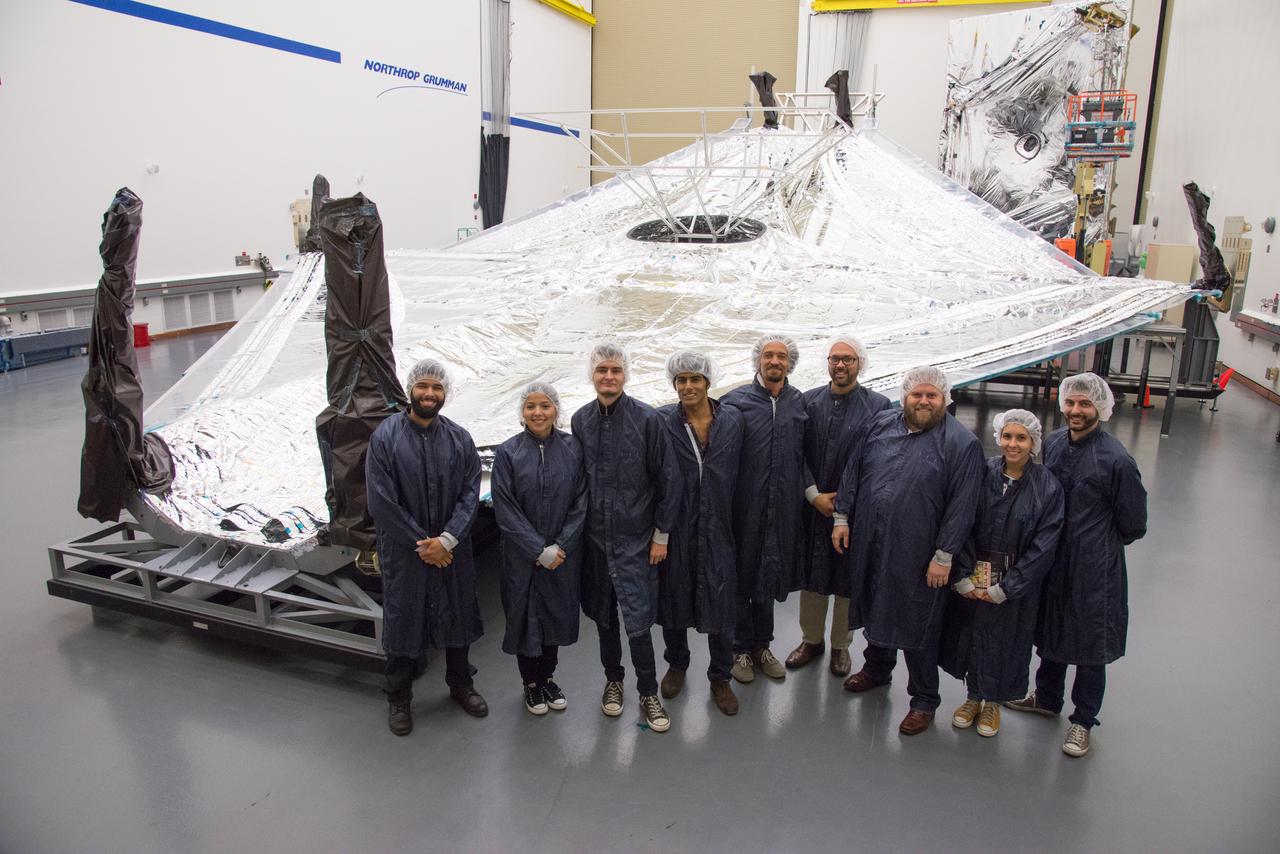 Students and teachers from the New York Film Academy visited Northrop Grumman’s Space Park facility in December 2014 for a tour of the James Webb Space Telescope, and got an up-close look at the tennis-court-sized sunshield that will keep the telescope cool in deep space. Photo courtesy of Northrop Grumman Corporation