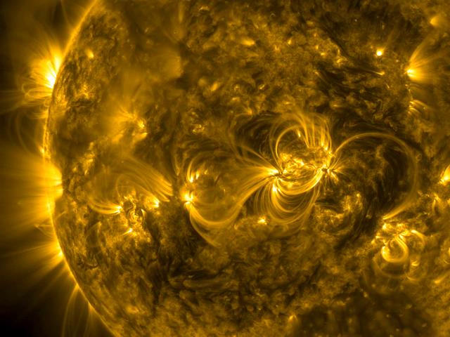 A series of linked loops across the face of the Sun highlighted the dynamic magnetic connections generated by several active regions (Jan. 3-6, 2015). Active regions have magnetic north and south polarity and the arcing loops find the opposite pole to make the connection. What is unusual here is that they all kind of line up and link nicely together. These movies are made in a wavelength of extreme ultraviolet light. Credit: NASA/Solar Dynamics Observatory <b><a href="http://www.nasa.gov/audience/formedia/features/MP_Photo_Guidelines.html" rel="nofollow">NASA image use policy.</a></b> <b><a href="http://www.nasa.gov/centers/goddard/home/index.html" rel="nofollow">NASA Goddard Space Flight Center</a></b> enables NASA’s mission through four scientific endeavors: Earth Science, Heliophysics, Solar System Exploration, and Astrophysics. Goddard plays a leading role in NASA’s accomplishments by contributing compelling scientific knowledge to advance the Agency’s mission. <b>Follow us on <a href="http://twitter.com/NASAGoddardPix" rel="nofollow">Twitter</a></b> <b>Like us on <a href="http://www.facebook.com/pages/Greenbelt-MD/NASA-Goddard/395013845897?ref=tsd" rel="nofollow">Facebook</a></b> <b>Find us on <a href="http://instagram.com/nasagoddard?vm=grid" rel="nofollow">Instagram</a></b>