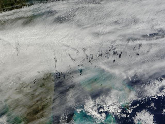 NASA image: Hole punch clouds over the Bahamas