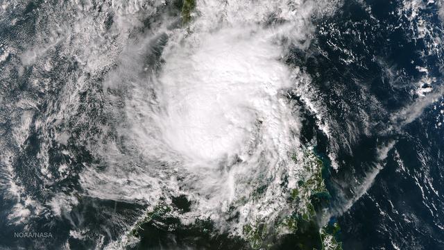 Tropical Storm Hagupit's low level circulation center is being obscured by its deep central convection and intensities are hard to pinpoint as the storm interacts with land. Once clear over the waters of the South China Sea Hagupit is forecast to continue weakening as it approaches the southern coast of Vietnam. This image was taken by the Suomi NPP satellite's VIIRS instrument around 0510Z on December 8, 2014.  NASA/NOAA/NPP  Credit: NASA/NOAA via <b><a href="www.nnvl.noaa.gov/" rel="nofollow"> NOAA Environmental Visualization Laboratory</a></b>  <b><a href="http://www.nasa.gov/audience/formedia/features/MP_Photo_Guidelines.html" rel="nofollow">NASA image use policy.</a></b>  <b><a href="http://www.nasa.gov/centers/goddard/home/index.html" rel="nofollow">NASA Goddard Space Flight Center</a></b> enables NASA’s mission through four scientific endeavors: Earth Science, Heliophysics, Solar System Exploration, and Astrophysics. Goddard plays a leading role in NASA’s accomplishments by contributing compelling scientific knowledge to advance the Agency’s mission. <b>Follow us on <a href="http://twitter.com/NASAGoddardPix" rel="nofollow">Twitter</a></b> <b>Like us on <a href="http://www.facebook.com/pages/Greenbelt-MD/NASA-Goddard/395013845897?ref=tsd" rel="nofollow">Facebook</a></b> <b>Find us on <a href="http://instagram.com/nasagoddard?vm=grid" rel="nofollow">Instagram</a></b> 