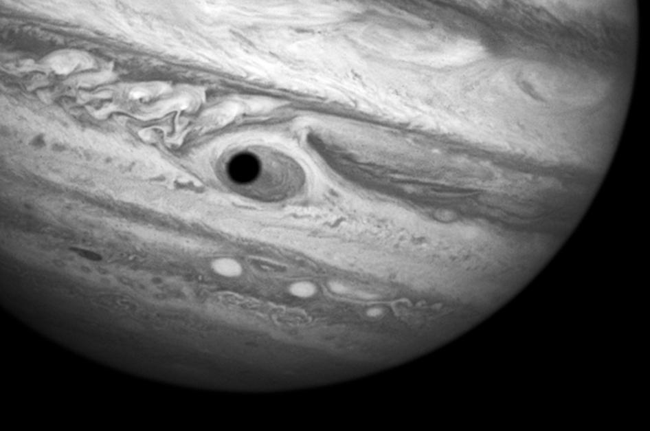 This trick that the planet is looking back at you is actually a Hubble treat: An eerie, close-up view of Jupiter, the biggest planet in our solar system. Hubble was monitoring changes in Jupiter’s immense Great Red Spot (GRS) storm on April 21, 2014, when the shadow of the Jovian moon, Ganymede, swept across the center of the storm. This gave the giant planet the uncanny appearance of having a pupil in the center of a 10,000 mile-diameter “eye.” For a moment, Jupiter “stared” back at Hubble like a one-eyed giant Cyclops.   Credit: NASA, ESA, and A. Simon (Goddard Space Flight Center)  <b><a href="http://www.nasa.gov/audience/formedia/features/MP_Photo_Guidelines.html" rel="nofollow">NASA image use policy.</a></b>  <b><a href="http://www.nasa.gov/centers/goddard/home/index.html" rel="nofollow">NASA Goddard Space Flight Center</a></b> enables NASA’s mission through four scientific endeavors: Earth Science, Heliophysics, Solar System Exploration, and Astrophysics. Goddard plays a leading role in NASA’s accomplishments by contributing compelling scientific knowledge to advance the Agency’s mission. <b>Follow us on <a href="http://twitter.com/NASAGoddardPix" rel="nofollow">Twitter</a></b> <b>Like us on <a href="http://www.facebook.com/pages/Greenbelt-MD/NASA-Goddard/395013845897?ref=tsd" rel="nofollow">Facebook</a></b> <b>Find us on <a href="http://instagram.com/nasagoddard?vm=grid" rel="nofollow">Instagram</a></b>