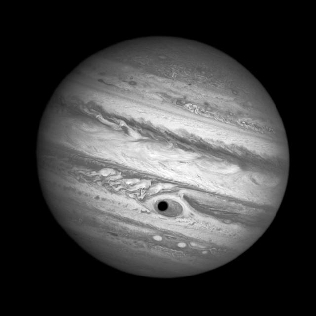 This trick that the planet is looking back at you is actually a Hubble treat: An eerie, close-up view of Jupiter, the biggest planet in our solar system. Hubble was monitoring changes in Jupiter’s immense Great Red Spot (GRS) storm on April 21, 2014, when the shadow of the Jovian moon, Ganymede, swept across the center of the storm. This gave the giant planet the uncanny appearance of having a pupil in the center of a 10,000 mile-diameter “eye.” For a moment, Jupiter “stared” back at Hubble like a one-eyed giant Cyclops.   Credit: NASA, ESA, and A. Simon (Goddard Space Flight Center)  <b><a href="http://www.nasa.gov/audience/formedia/features/MP_Photo_Guidelines.html" rel="nofollow">NASA image use policy.</a></b>  <b><a href="http://www.nasa.gov/centers/goddard/home/index.html" rel="nofollow">NASA Goddard Space Flight Center</a></b> enables NASA’s mission through four scientific endeavors: Earth Science, Heliophysics, Solar System Exploration, and Astrophysics. Goddard plays a leading role in NASA’s accomplishments by contributing compelling scientific knowledge to advance the Agency’s mission. <b>Follow us on <a href="http://twitter.com/NASAGoddardPix" rel="nofollow">Twitter</a></b> <b>Like us on <a href="http://www.facebook.com/pages/Greenbelt-MD/NASA-Goddard/395013845897?ref=tsd" rel="nofollow">Facebook</a></b> <b>Find us on <a href="http://instagram.com/nasagoddard?vm=grid" rel="nofollow">Instagram</a></b>