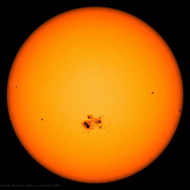 On Oct. 18, 2014, a sunspot rotated over the left side of the sun, and soon grew to be the largest active region seen in the current solar cycle, which began in 2008. Currently, the sunspot is almost 80,000 miles across -- ten Earth's could be laid across its diameter.  Sunspots point to relatively cooler areas on the sun with intense and complex magnetic fields poking out through the sun's surface. Such areas can be the source of solar eruptions such as flares or coronal mass ejections.  So far, this active region – labeled AR 12192 -- has produced several significant solar flares: an X-class flare on Oct. 19, an M-class flare on Oct. 21, and an X-class flare on Oct. 22, 2014.  The largest sunspot on record occurred in 1947 and was almost three times as large as the current one.  Active regions are more common at the moment as we are in what's called solar maximum, which is the peak of the sun's activity, occurring approximately every 11 years.  Credit: NASA/SDO  <b><a href="http://www.nasa.gov/audience/formedia/features/MP_Photo_Guidelines.html" rel="nofollow">NASA image use policy.</a></b>  <b><a href="http://www.nasa.gov/centers/goddard/home/index.html" rel="nofollow">NASA Goddard Space Flight Center</a></b> enables NASA’s mission through four scientific endeavors: Earth Science, Heliophysics, Solar System Exploration, and Astrophysics. Goddard plays a leading role in NASA’s accomplishments by contributing compelling scientific knowledge to advance the Agency’s mission. <b>Follow us on <a href="http://twitter.com/NASAGoddardPix" rel="nofollow">Twitter</a></b> <b>Like us on <a href="http://www.facebook.com/pages/Greenbelt-MD/NASA-Goddard/395013845897?ref=tsd" rel="nofollow">Facebook</a></b> <b>Find us on <a href="http://instagram.com/nasagoddard?vm=grid" rel="nofollow">Instagram</a></b>