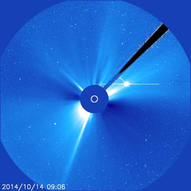 The Sun blew out a powerful coronal mass ejection (CME) from just around the edge of the Sun (Oct. 14, 2014). The particle cloud expanded around all the Sun in a rough circle, hence the name 'halo' CME. This event was also associated with a fairly strong flare. The active region that was the source of these events is just rotating into view. Then, we can better observe its size and structure. The bright object to the right and just above the Sun is Venus now on the far side of the Sun.   Credit: NASA/ESA/SOHO  <b><a href="http://www.nasa.gov/audience/formedia/features/MP_Photo_Guidelines.html" rel="nofollow">NASA image use policy.</a></b>  <b><a href="http://www.nasa.gov/centers/goddard/home/index.html" rel="nofollow">NASA Goddard Space Flight Center</a></b> enables NASA’s mission through four scientific endeavors: Earth Science, Heliophysics, Solar System Exploration, and Astrophysics. Goddard plays a leading role in NASA’s accomplishments by contributing compelling scientific knowledge to advance the Agency’s mission. <b>Follow us on <a href="http://twitter.com/NASAGoddardPix" rel="nofollow">Twitter</a></b> <b>Like us on <a href="http://www.facebook.com/pages/Greenbelt-MD/NASA-Goddard/395013845897?ref=tsd" rel="nofollow">Facebook</a></b> <b>Find us on <a href="http://instagram.com/nasagoddard?vm=grid" rel="nofollow">Instagram</a></b>