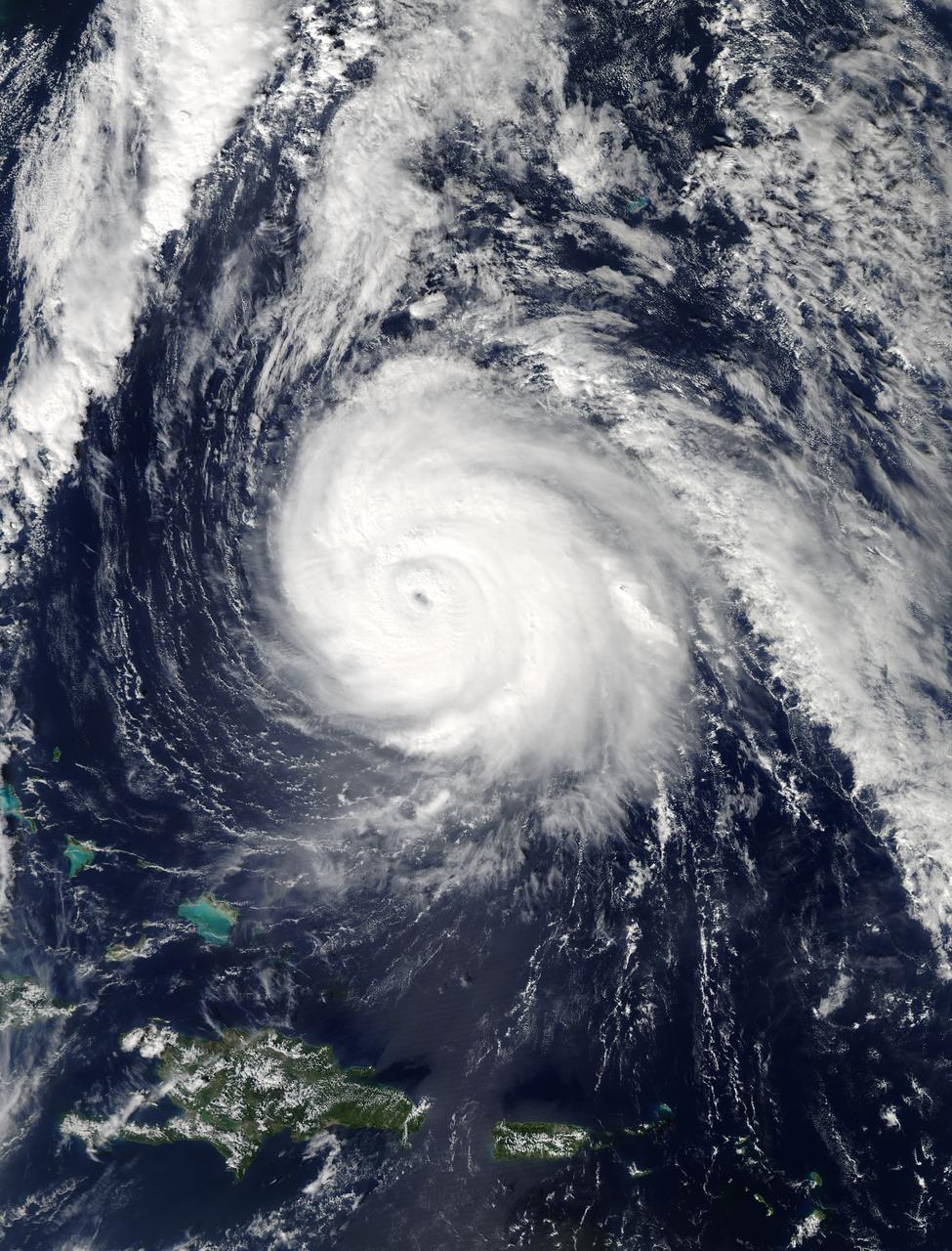 On Oct. 16 at 17:45 UTC NASA's Terra satellite captured this image of Hurricane Gonzalo in the Atlantic Ocean. Image Credit: NASA Goddard MODIS Rapid Response Team-- NASA and NOAA satellites have been providing continuous coverage of Hurricane Gonzalo as it moves toward Bermuda. NASA's Terra satellite saw thunderstorms wrapped tightly around the center with large bands of thunderstorms wrapping into it. NOAA's GOES-East satellite provided and "eye-opening" view of Gonzalo, still a Category 4 hurricane on Oct. 16. A hurricane warning is in effect for Bermuda and that means that hurricane conditions are expected within the warning area, meaning the entire island. Read more: <a href="http://www.nasa.gov/content/goddard/gonzalo-atlantic-ocean/index.html#.VEFIDN6FxgM" rel="nofollow">www.nasa.gov/content/goddard/gonzalo-atlantic-ocean/index...</a> <b><a href="http://www.nasa.gov/audience/formedia/features/MP_Photo_Guidelines.html" rel="nofollow">NASA image use policy.</a></b> <b><a href="http://www.nasa.gov/centers/goddard/home/index.html" rel="nofollow">NASA Goddard Space Flight Center</a></b> enables NASA’s mission through four scientific endeavors: Earth Science, Heliophysics, Solar System Exploration, and Astrophysics. Goddard plays a leading role in NASA’s accomplishments by contributing compelling scientific knowledge to advance the Agency’s mission. <b>Follow us on <a href="http://twitter.com/NASAGoddardPix" rel="nofollow">Twitter</a></b> <b>Like us on <a href="http://www.facebook.com/pages/Greenbelt-MD/NASA-Goddard/395013845897?ref=tsd" rel="nofollow">Facebook</a></b> <b>Find us on <a href="http://instagram.com/nasagoddard?vm=grid" rel="nofollow">Instagram</a></b>