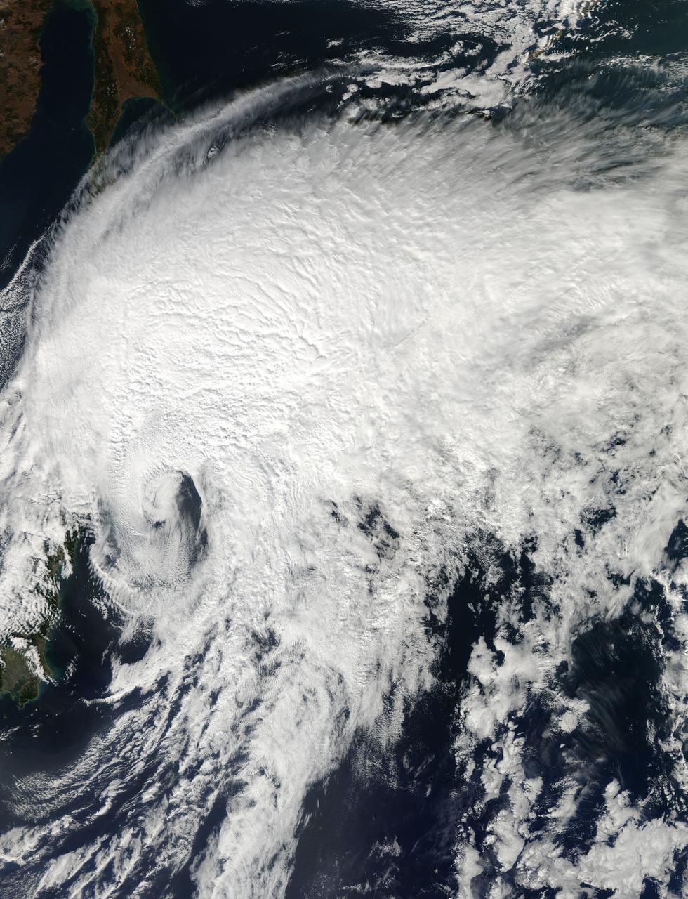 NASA's Aqua satellite passed over Extra-Tropical Storm Vongfong on Oct. 4 as it was moving away from Hokkaido, Japan, the northernmost of the big islands. Vongfong transitioned into an extra-tropical storm early on Oct. 4 as its core changed from warm to cold.  The MODIS or Moderate Resolution Imaging Spectroradiometer instrument aboard NASA's Aqua satellite captured a visible image of Tropical Storm Vongfong over Japan on Oct. 14 at 03:15 UTC as it was southeast of the island of Hokkaido, Japan. The image showed that south of the center of circulation was almost devoid of clouds and showers, which were all pushed to the north and east of the center as a result of southwesterly wind shear. At 0300 UTC on Oct. 14, the Joint Typhoon Warning Center issued its final advisory on Tropical storm Vongfong. At that time Vongfong's center was located near 29.1 north latitude and 142.9 east longitude, about 111 nautical miles (127.7 miles/205.6 km) southeast of Misawa, Japan. Vongfong was moving to the northeast at a speedy 36 knots (41.4 mph/66.67 kph). Vongfong's maximum sustained winds were near 35 knots (40.2 mph/64.8 kph).  Vongfong had transitioned into an extra-tropical system and will continue to move away from northern Japan and over the northwestern Pacific Ocean.  Credit: NASA/GSFC/Jeff Schmaltz/MODIS Land Rapid Response Team    <b><a href="http://www.nasa.gov/audience/formedia/features/MP_Photo_Guidelines.html" rel="nofollow">NASA image use policy.</a></b>  <b><a href="http://www.nasa.gov/centers/goddard/home/index.html" rel="nofollow">NASA Goddard Space Flight Center</a></b> enables NASA’s mission through four scientific endeavors: Earth Science, Heliophysics, Solar System Exploration, and Astrophysics. Goddard plays a leading role in NASA’s accomplishments by contributing compelling scientific knowledge to advance the Agency’s mission. <b>Follow us on <a href="http://twitter.com/NASAGoddardPix" rel="nofollow">Twitter</a></b> <b>Like us on <a href="http://www.facebook.com/pages/Greenbelt-MD/NASA-Goddard/395013845897?ref=tsd" rel="nofollow">Facebook</a></b> <b>Find us on <a href="http://instagram.com/nasagoddard?vm=grid" rel="nofollow">Instagram</a></b> 