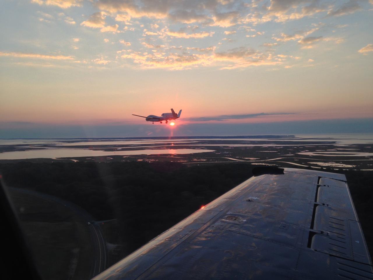View from a Chase Plane; HS3 Science Flight 8 Wraps Up The chase plane accompanying NASA's Global Hawk No. 872 captured this picture on Sept. 19 after the Global Hawk completed science flight #8 where it gathered data from a weakening Tropical Storm Edouard over the North Atlantic Ocean. Credit: NASA -- The Hurricane and Severe Storm Sentinel (HS3) is a five-year mission specifically targeted to investigate the processes that underlie hurricane formation and intensity change in the Atlantic Ocean basin. HS3 is motivated by hypotheses related to the relative roles of the large-scale environment and storm-scale internal processes. Read more: espo.nasa.gov/missions/hs3/mission-gallery <b><a href="http://www.nasa.gov/audience/formedia/features/MP_Photo_Guidelines.html" rel="nofollow">NASA image use policy.</a></b> <b><a href="http://www.nasa.gov/centers/goddard/home/index.html" rel="nofollow">NASA Goddard Space Flight Center</a></b> enables NASA’s mission through four scientific endeavors: Earth Science, Heliophysics, Solar System Exploration, and Astrophysics. Goddard plays a leading role in NASA’s accomplishments by contributing compelling scientific knowledge to advance the Agency’s mission. <b>Follow us on <a href="http://twitter.com/NASAGoddardPix" rel="nofollow">Twitter</a></b> <b>Like us on <a href="http://www.facebook.com/pages/Greenbelt-MD/NASA-Goddard/395013845897?ref=tsd" rel="nofollow">Facebook</a></b> <b>Find us on <a href="http://instagram.com/nasagoddard?vm=grid" rel="nofollow">Instagram</a></b>