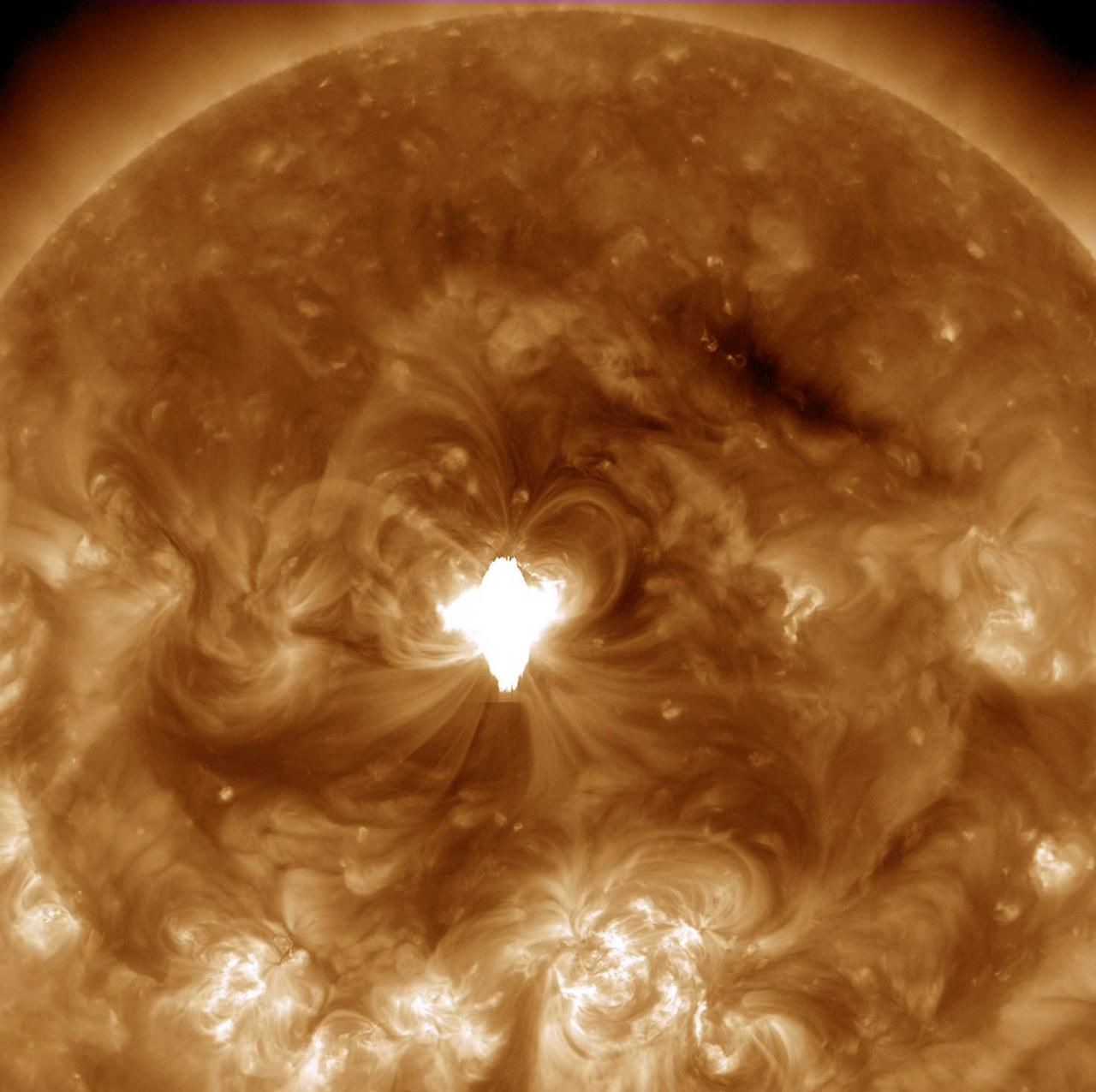 An active region just about squarely facing Earth erupted with an X 1.6 flare (largest class) as well as a coronal mass ejection on Sept. 10, 2014. The flare lasted longer than usual and sent out a burst of radiation into space. The movie shows the bright, flickering flare and the ensuing coils of magnetic loops over a period of about five hours. A darker wave of material was also propelled across part of the Sun's surface. Images were taken in a wavelength of extreme ultraviolet light. Credit: NASA/Solar Dynamics Observatory <b><a href="http://www.nasa.gov/audience/formedia/features/MP_Photo_Guidelines.html" rel="nofollow">NASA image use policy.</a></b> <b><a href="http://www.nasa.gov/centers/goddard/home/index.html" rel="nofollow">NASA Goddard Space Flight Center</a></b> enables NASA’s mission through four scientific endeavors: Earth Science, Heliophysics, Solar System Exploration, and Astrophysics. Goddard plays a leading role in NASA’s accomplishments by contributing compelling scientific knowledge to advance the Agency’s mission. <b>Follow us on <a href="http://twitter.com/NASAGoddardPix" rel="nofollow">Twitter</a></b> <b>Like us on <a href="http://www.facebook.com/pages/Greenbelt-MD/NASA-Goddard/395013845897?ref=tsd" rel="nofollow">Facebook</a></b> <b>Find us on <a href="http://instagram.com/nasagoddard?vm=grid" rel="nofollow">Instagram</a></b>