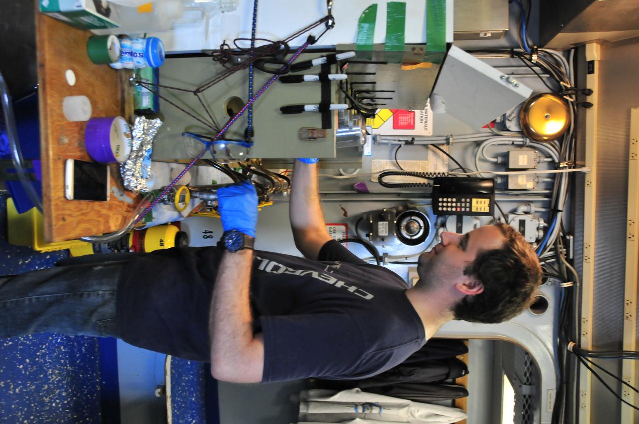 What's in the Water?   Robert Foster, of the City College of New York, filters seawater on July 23, 2414, for chlorophyll analysis in a lab on the R/V Endeavor.   NASA's Ship-Aircraft Bio-Optical Research (SABOR) experiment is a coordinated ship and aircraft observation campaign off the Atlantic coast of the United States, an effort to advance space-based capabilities for monitoring microscopic plants that form the base of the marine food chain.   Read more: <a href="http://1.usa.gov/WWRVzj" rel="nofollow">1.usa.gov/WWRVzj</a>   Credit: NASA/SABOR/Wayne Slade, Sequoia Scientific..<b><a href="http://www.nasa.gov/audience/formedia/features/MP_Photo_Guidelines.html" rel="nofollow">NASA image use policy.</a></b>  <b><a href="http://www.nasa.gov/centers/goddard/home/index.html" rel="nofollow">NASA Goddard Space Flight Center</a></b> enables NASA’s mission through four scientific endeavors: Earth Science, Heliophysics, Solar System Exploration, and Astrophysics. Goddard plays a leading role in NASA’s accomplishments by contributing compelling scientific knowledge to advance the Agency’s mission. <b>Follow us on <a href="http://twitter.com/NASAGoddardPix" rel="nofollow">Twitter</a></b> <b>Like us on <a href="http://www.facebook.com/pages/Greenbelt-MD/NASA-Goddard/395013845897?ref=tsd" rel="nofollow">Facebook</a></b> <b>Find us on <a href="http://instagram.com/nasagoddard?vm=grid" rel="nofollow">Instagram</a></b> 
