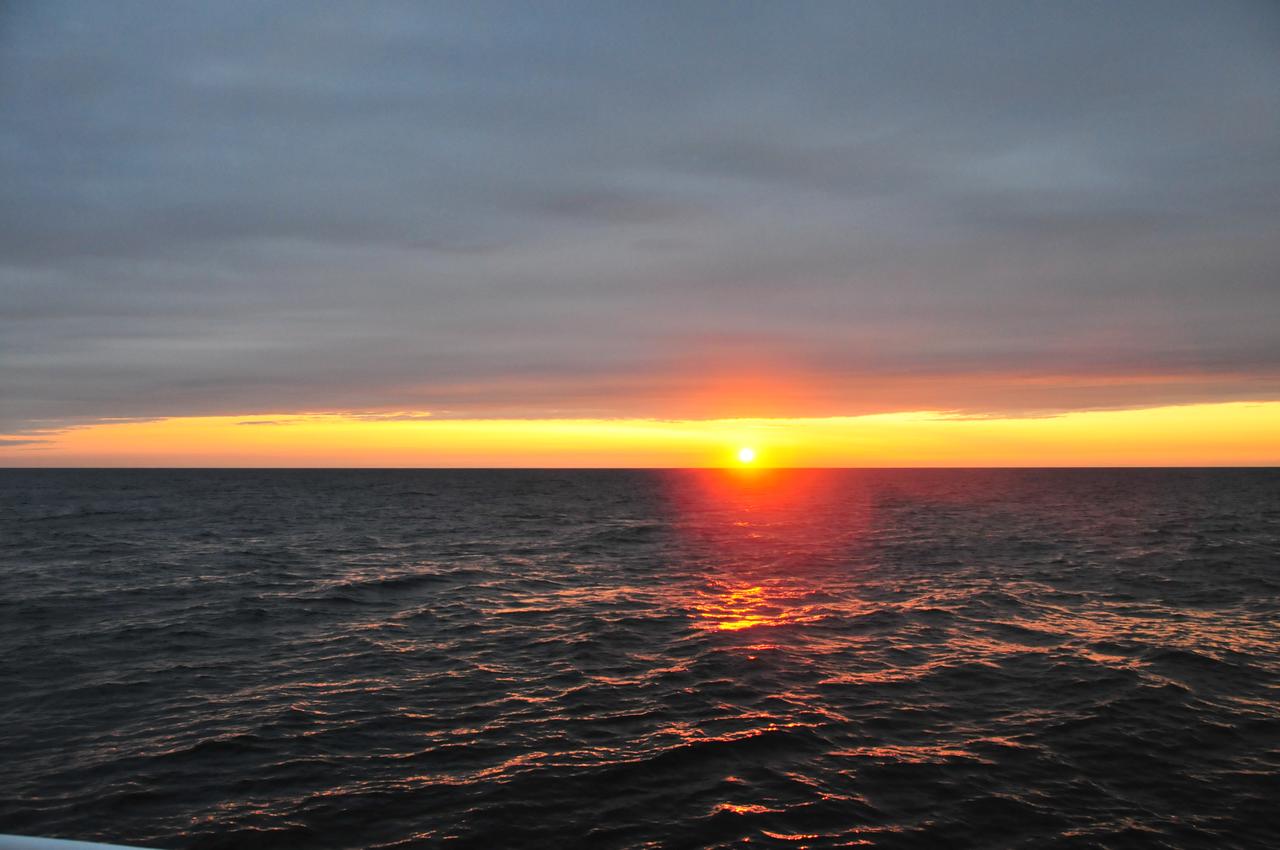 Sunset Over the Gulf of Maine   On July 20, 2013, scientists at sea with NASA's SABOR experiment witnessed a spectacular sunset over the Gulf of Maine.   NASA's Ship-Aircraft Bio-Optical Research (SABOR) experiment is a coordinated ship and aircraft observation campaign off the Atlantic coast of the United States, an effort to advance space-based capabilities for monitoring microscopic plants that form the base of the marine food chain.   Read more: <a href="http://1.usa.gov/WWRVzj" rel="nofollow">1.usa.gov/WWRVzj</a>   Credit: NASA/SABOR/Wayne Slade, Sequoia Scientific .<b><a href="http://www.nasa.gov/audience/formedia/features/MP_Photo_Guidelines.html" rel="nofollow">NASA image use policy.</a></b>  <b><a href="http://www.nasa.gov/centers/goddard/home/index.html" rel="nofollow">NASA Goddard Space Flight Center</a></b> enables NASA’s mission through four scientific endeavors: Earth Science, Heliophysics, Solar System Exploration, and Astrophysics. Goddard plays a leading role in NASA’s accomplishments by contributing compelling scientific knowledge to advance the Agency’s mission. <b>Follow us on <a href="http://twitter.com/NASAGoddardPix" rel="nofollow">Twitter</a></b> <b>Like us on <a href="http://www.facebook.com/pages/Greenbelt-MD/NASA-Goddard/395013845897?ref=tsd" rel="nofollow">Facebook</a></b> <b>Find us on <a href="http://instagram.com/nasagoddard?vm=grid" rel="nofollow">Instagram</a></b> 