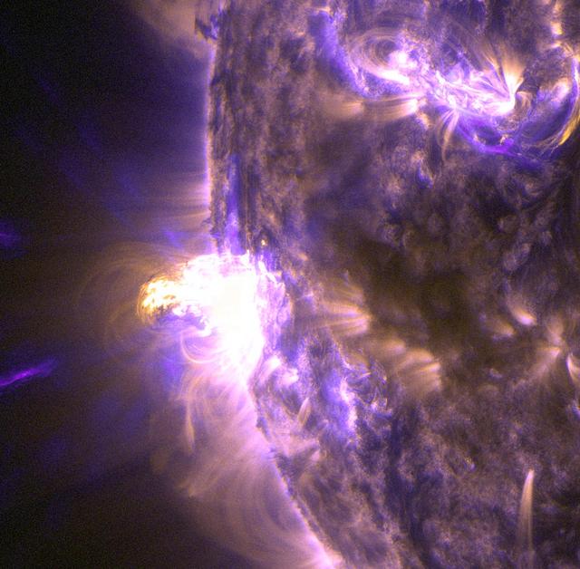 On Aug. 24, 2014, the sun emitted a mid-level solar flare, peaking at 8:16 a.m. EDT. NASA's Solar Dynamics Observatory captured images of the flare, which erupted on the left side of the sun. Solar flares are powerful bursts of radiation. Harmful radiation from a flare cannot pass through Earth's atmosphere to physically affect humans on the ground, however -- when intense enough -- they can disturb the atmosphere in the layer where GPS and communications signals travel. This close-up of a moderate flare on Aug. 24, 2014, shows light in the 131 and 171 Angstrom wavelengths. The former wavelength, usually colorized in teal, highlights the extremely hot material of a flare. The latter, usually colorized in gold, highlights magnet loops in the sun's atmosphere. To see how this event may affect Earth, please visit NOAA's Space Weather Prediction Center at <a href="http://spaceweather.gov" rel="nofollow">spaceweather.gov</a>, the U.S. government's official source for space weather forecasts, alerts, watches and warnings. This flare is classified as an M5 flare. M-class flares are ten times less powerful than the most intense flares, called X-class flares. Credit: NASA/Goddard/SDO <b><a href="http://www.nasa.gov/audience/formedia/features/MP_Photo_Guidelines.html" rel="nofollow">NASA image use policy.</a></b> <b><a href="http://www.nasa.gov/centers/goddard/home/index.html" rel="nofollow">NASA Goddard Space Flight Center</a></b> enables NASA’s mission through four scientific endeavors: Earth Science, Heliophysics, Solar System Exploration, and Astrophysics. Goddard plays a leading role in NASA’s accomplishments by contributing compelling scientific knowledge to advance the Agency’s mission. <b>Follow us on <a href="http://twitter.com/NASAGoddardPix" rel="nofollow">Twitter</a></b> <b>Like us on <a href="http://www.facebook.com/pages/Greenbelt-MD/NASA-Goddard/395013845897?ref=tsd" rel="nofollow">Facebook</a></b> <b>Find us on <a href="http://instagram.com/nasagoddard?vm=grid" rel="nofollow">Instagram</a></b>