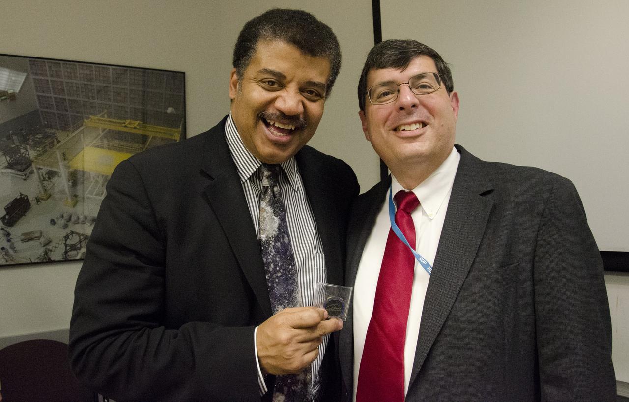 Dr. Neil deGrasse Tyson visited with Goddard's Space Flight Center Director Chris Scolese and the James Webb Space Telescope team at Goddard in Greenbelt, Md. on June 3, 2014. Tyson spoke to the team and was able to see the giant vacuum test chamber that now holds the heart of the telescope, the Integrated Science Instrument Module. ..Learn more about JWST: <a href="http://www.jwst.nasa.gov..Credit" rel="nofollow">www.jwst.nasa.gov..Credit</a>: NASA/Goddard/Rebecca Roth..<b><a href="http://www.nasa.gov/audience/formedia/features/MP_Photo_Guidelines.html" rel="nofollow">NASA image use policy.</a></b>  <b><a href="http://www.nasa.gov/centers/goddard/home/index.html" rel="nofollow">NASA Goddard Space Flight Center</a></b> enables NASA’s mission through four scientific endeavors: Earth Science, Heliophysics, Solar System Exploration, and Astrophysics. Goddard plays a leading role in NASA’s accomplishments by contributing compelling scientific knowledge to advance the Agency’s mission.  <b>Follow us on <a href="http://twitter.com/NASAGoddardPix" rel="nofollow">Twitter</a></b>  <b>Like us on <a href="http://www.facebook.com/pages/Greenbelt-MD/NASA-Goddard/395013845897?ref=tsd" rel="nofollow">Facebook</a></b>  <b>Find us on <a href="http://instagram.com/nasagoddard?vm=grid" rel="nofollow">Instagram</a></b> 