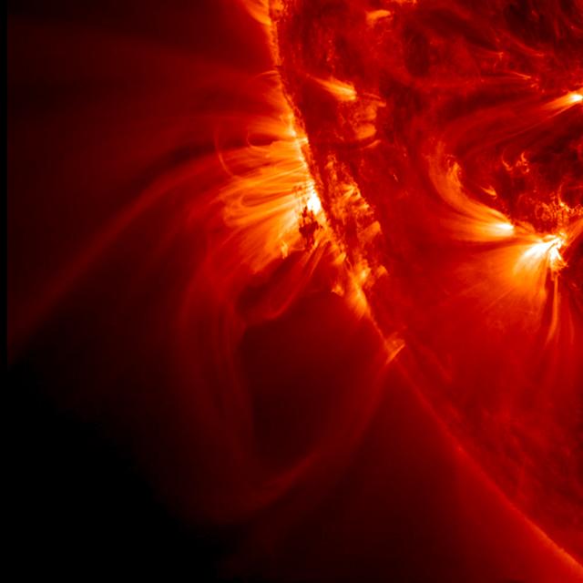 NASA's Solar Dynamics Observatory (SDO) zoomed in almost to its maximum level to watch tight, bright loops and much longer, softer loops shift and sway above an active region on the sun, while a darker blob of plasma in their midst was pulled about every which way (May 13-14, 2014). Credit: NASA/Solar Dynamics Observatory <b><a href="http://www.nasa.gov/audience/formedia/features/MP_Photo_Guidelines.html" rel="nofollow">NASA image use policy.</a></b> <b><a href="http://www.nasa.gov/centers/goddard/home/index.html" rel="nofollow">NASA Goddard Space Flight Center</a></b> enables NASA’s mission through four scientific endeavors: Earth Science, Heliophysics, Solar System Exploration, and Astrophysics. Goddard plays a leading role in NASA’s accomplishments by contributing compelling scientific knowledge to advance the Agency’s mission. <b>Follow us on <a href="http://twitter.com/NASAGoddardPix" rel="nofollow">Twitter</a></b> <b>Like us on <a href="http://www.facebook.com/pages/Greenbelt-MD/NASA-Goddard/395013845897?ref=tsd" rel="nofollow">Facebook</a></b> <b>Find us on <a href="http://instagram.com/nasagoddard?vm=grid" rel="nofollow">Instagram</a></b>