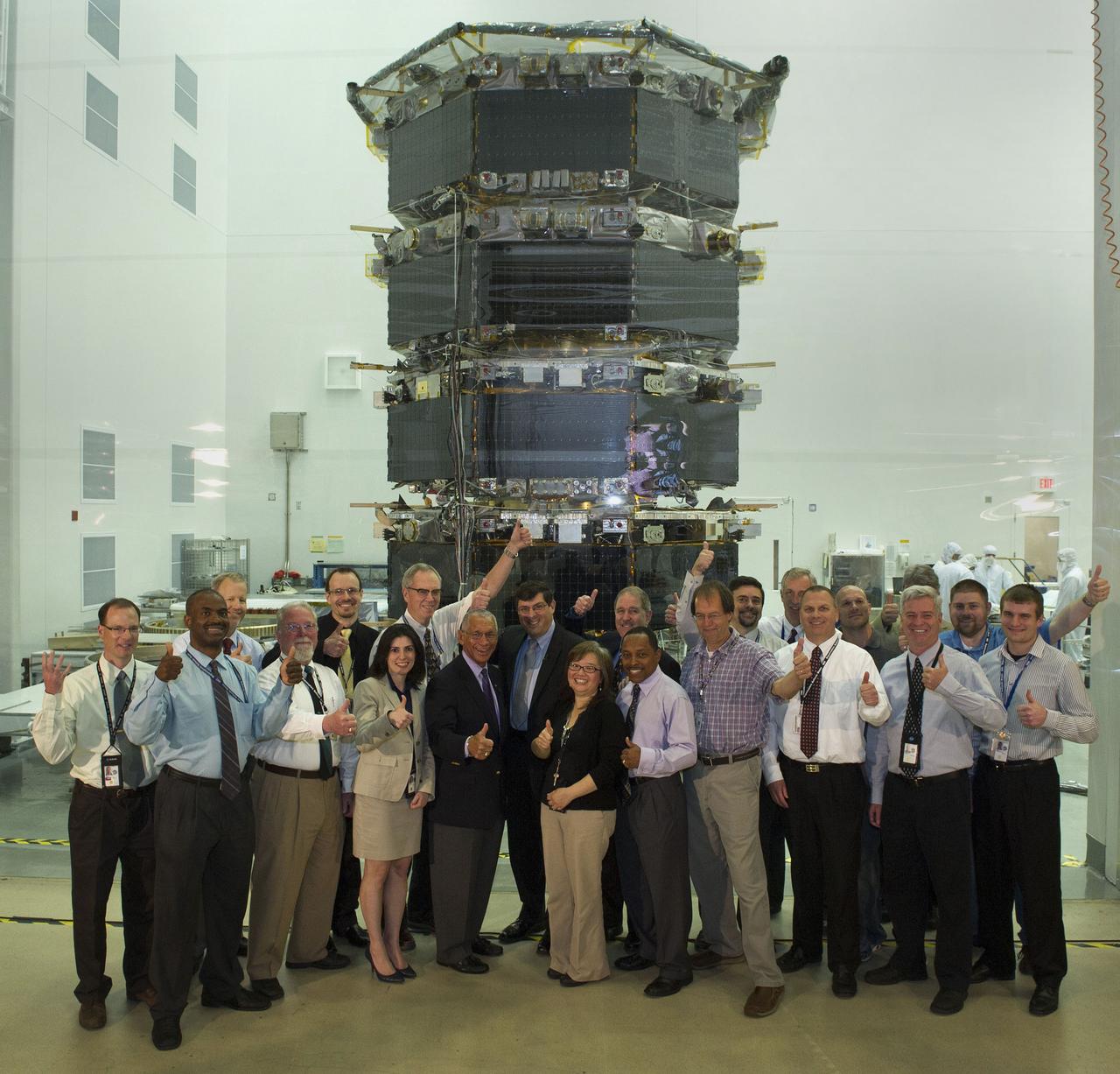 NASA Administrator Charles Bolden got a firsthand look at work being done on the four Magnetospheric Multiscale (MMS) spacecraft during his visit to the agency's Goddard Space Flight Center in Greenbelt, Maryland, on May 12. Standing 20 feet high inside a Goddard clean room, the spacecraft were in their "four-stack" formation, similar to how they will be arranged inside their launch vehicle. The MMS spacecraft recently completed vibration testing. With MMS as a backdrop, Bolden and Goddard Center Director Chris Scolese discussed the mission, ground testing and preparations for launch with project personnel. Read more: <a href="http://go.nasa.gov/1jSza7E" rel="nofollow">go.nasa.gov/1jSza7E</a> Credit: NASA/Goddard/Bill Hrybyk <b><a href="http://www.nasa.gov/audience/formedia/features/MP_Photo_Guidelines.html" rel="nofollow">NASA image use policy.</a></b> <b><a href="http://www.nasa.gov/centers/goddard/home/index.html" rel="nofollow">NASA Goddard Space Flight Center</a></b> enables NASA’s mission through four scientific endeavors: Earth Science, Heliophysics, Solar System Exploration, and Astrophysics. Goddard plays a leading role in NASA’s accomplishments by contributing compelling scientific knowledge to advance the Agency’s mission. <b>Follow us on <a href="http://twitter.com/NASAGoddardPix" rel="nofollow">Twitter</a></b> <b>Like us on <a href="http://www.facebook.com/pages/Greenbelt-MD/NASA-Goddard/395013845897?ref=tsd" rel="nofollow">Facebook</a></b> <b>Find us on <a href="http://instagram.com/nasagoddard?vm=grid" rel="nofollow">Instagram</a></b>