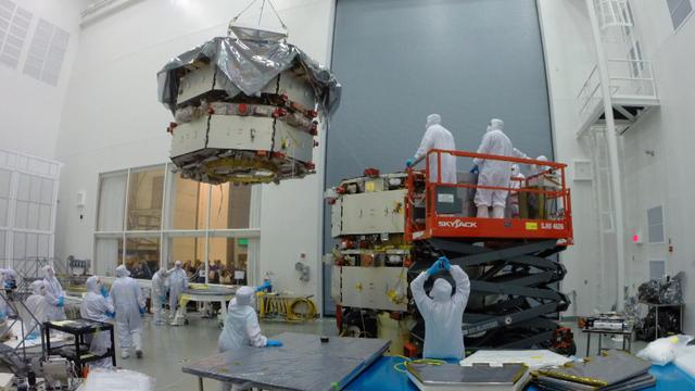 MMS Four Separate – View of all four spacecraft in the MMS Cleanroom getting prepared for stacking operations. Learn more about MMS at <a href="http://www.nasa.gov/mms" rel="nofollow">www.nasa.gov/mms</a> Credit NASA/Chris Gunn The Magnetospheric Multiscale, or MMS, will study how the sun and the Earth's magnetic fields connect and disconnect, an explosive process that can accelerate particles through space to nearly the speed of light. This process is called magnetic reconnection and can occur throughout all space. <b><a href="http://www.nasa.gov/audience/formedia/features/MP_Photo_Guidelines.html" rel="nofollow">NASA image use policy.</a></b> <b><a href="http://www.nasa.gov/centers/goddard/home/index.html" rel="nofollow">NASA Goddard Space Flight Center</a></b> enables NASA’s mission through four scientific endeavors: Earth Science, Heliophysics, Solar System Exploration, and Astrophysics. Goddard plays a leading role in NASA’s accomplishments by contributing compelling scientific knowledge to advance the Agency’s mission. <b>Follow us on <a href="http://twitter.com/NASAGoddardPix" rel="nofollow">Twitter</a></b> <b>Like us on <a href="http://www.facebook.com/pages/Greenbelt-MD/NASA-Goddard/395013845897?ref=tsd" rel="nofollow">Facebook</a></b> <b>Find us on <a href="http://instagram.com/nasagoddard?vm=grid" rel="nofollow">Instagram</a></b>