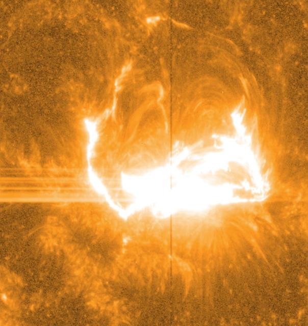 Like almost all solar observatories, NASA's IRIS can provide images of different layers of the sun's atmosphere, which together create a whole picture of what's happening. This image shows light at a wavelength of 1400 Angstrom, which highlights material some 650 miles above the sun's surface. The vertical line in the middle shows the slit for IRIS's spectrograph, which can separate light into its many wavelengths to provide even more information about the temperature and velocity of material during a flare.  Credit: NASA/IRIS/Goddard Space Flight Center   --  On March 29, 2014 the sun released an X-class flare. It was observed by NASA's Interface Region Imaging Spectrograph, or IRIS; NASA's Solar Dynamics Observatory, or SDO; NASA's Reuven Ramaty High Energy Solar Spectroscopic Imager, or RHESSI; the Japanese Aerospace Exploration Agency's Hinode; and the National Solar Observatory's Dunn Solar Telescope located at Sacramento Peak in New Mexico.  To have a record of such an intense flare from so many observatories is unprecedented. Such research can help scientists better understand what catalyst sets off these large explosions on the sun. Perhaps we may even some day be able to predict their onset and forewarn of the radio blackouts solar flares can cause near Earth - blackouts that can interfere with airplane, ship and military communications.   Read more: <a href="http://1.usa.gov/1kMDQbO" rel="nofollow">1.usa.gov/1kMDQbO</a>  Join our Google+ Hangout on May 8 at 2:30pm EST: <a href="http://go.nasa.gov/1mwbBEZ" rel="nofollow">go.nasa.gov/1mwbBEZ</a>  Credit: NASA Goddard  <b><a href="http://www.nasa.gov/audience/formedia/features/MP_Photo_Guidelines.html" rel="nofollow">NASA image use policy.</a></b>  <b><a href="http://www.nasa.gov/centers/goddard/home/index.html" rel="nofollow">NASA Goddard Space Flight Center</a></b> enables NASA’s mission through four scientific endeavors: Earth Science, Heliophysics, Solar System Exploration, and Astrophysics. Goddard plays a leading role in NASA’s accomplishments by contributing compelling scientific knowledge to advance the Agency’s mission.  <b>Follow us on <a href="http://twitter.com/NASAGoddardPix" rel="nofollow">Twitter</a></b>  <b>Like us on <a href="http://www.facebook.com/pages/Greenbelt-MD/NASA-Goddard/395013845897?ref=tsd" rel="nofollow">Facebook</a></b>  <b>Find us on <a href="http://instagram.com/nasagoddard?vm=grid" rel="nofollow">Instagram</a></b>