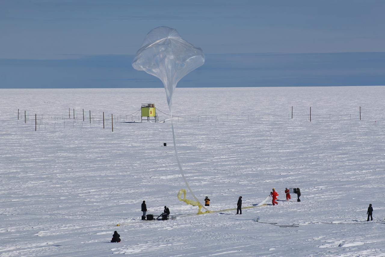 Release of a BARREL balloon. The launch crew can be seen on the right holding the payload as the top of the balloon moves overhead where they can release it.   Credit: NASA/Goddard/BARREL  Read more: <a href="http://www.nasa.gov/content/goddard/nasas-barrel-returns-successful-from-antarctica" rel="nofollow">www.nasa.gov/content/goddard/nasas-barrel-returns-success...</a>  --  Three months, 20 balloons, and one very successful campaign.  The team for NASA's BARREL – short for Balloon Array for Radiation belt Relativistic Electron Losses -- mission returned from Antarctica in March 2014.  BARREL's job is to help unravel the mysterious Van Allen belts, two gigantic donuts of radiation that surround Earth, which can shrink and swell in response to incoming energy and particles from the sun and sometimes expose satellites to harsh radiation. While in Antarctica, the team launched 20 balloons carrying instruments that sense charged particles that are scattered into the atmosphere from the belts, spiraling down the magnetic fields near the South Pole. Each balloon traveled around the pole for up to three weeks. The team will coordinate the BARREL data with observations from NASA's two Van Allen Probes to better understand how occurrences in the belts relate to bursts of particles funneling down toward Earth. BARREL team members will be on hand at the USA Science and Engineering Festival in DC on April 26 and 27, 2014 for the exhibit Space Balloons: Exploring the Extremes of Space Weather.  <b><a href="http://www.nasa.gov/audience/formedia/features/MP_Photo_Guidelines.html" rel="nofollow">NASA image use policy.</a></b><b><a href="http://www.nasa.gov/centers/goddard/home/index.html" rel="nofollow">NASA Goddard Space Flight Center</a></b> enables NASA’s mission through four scientific endeavors: Earth Science, Heliophysics, Solar System Exploration, and Astrophysics. Goddard plays a leading role in NASA’s accomplishments by contributing compelling scientific knowledge to advance the Agency’s mission.<b>Follow us on <a href="http://twitter.com/NASAGoddardPix" rel="nofollow">Twitter</a></b><b>Like us on <a href="http://www.facebook.com/pages/Greenbelt-MD/NASA-Goddard/395013845897?ref=tsd" rel="nofollow">Facebook</a></b><b>Find us on <a href="http://instagram.com/nasagoddard?vm=grid" rel="nofollow">Instagram</a></b>