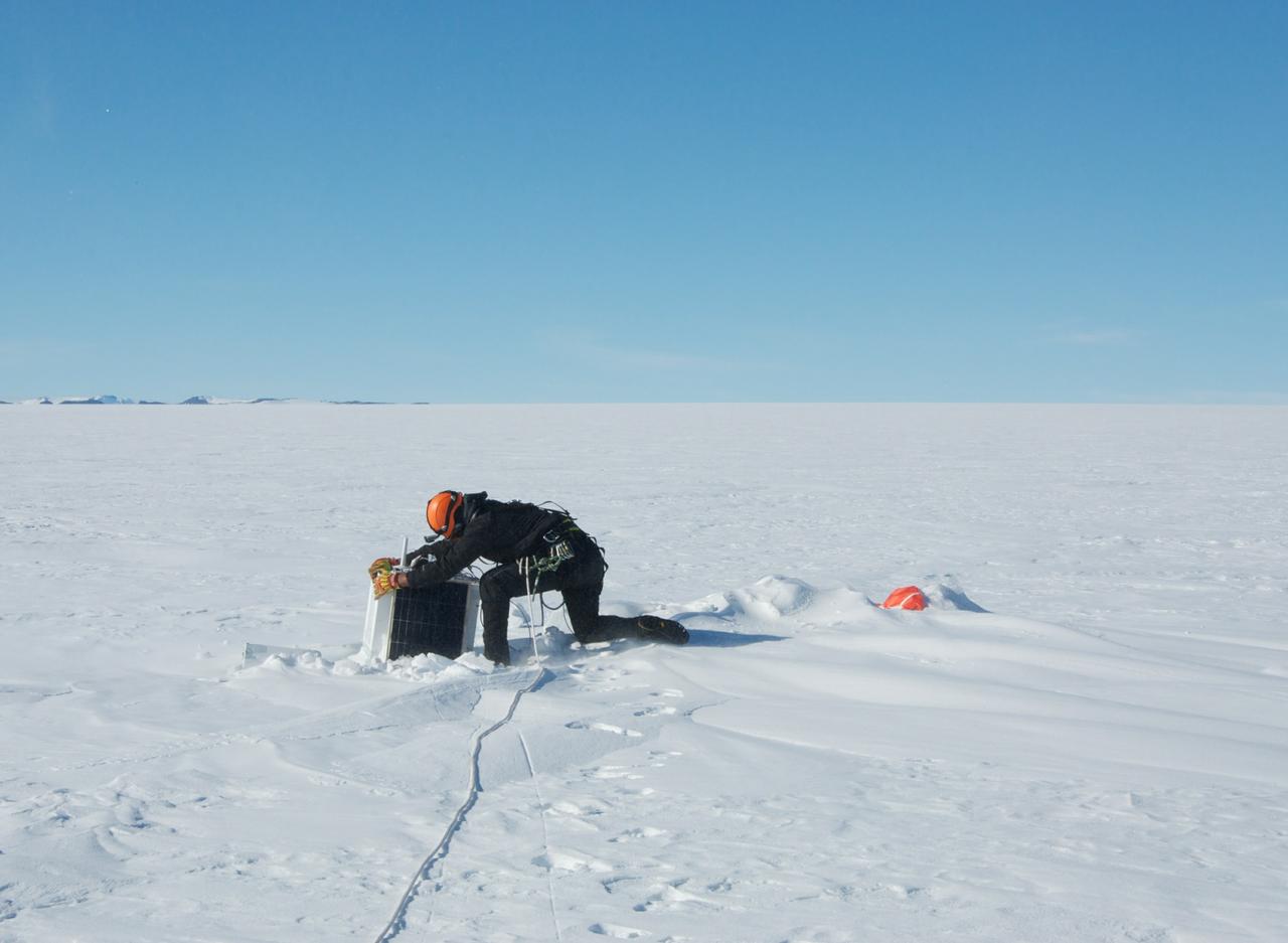 Recovery of a BARREL balloon payload after its flight. The recovery was carried out by helicopter. This area is known to be heavily crevassed so the base mountaineer is seen here with a safety rope.   Credit: NASA/Goddard/BARREL/Brett Anderson  Read more: <a href="http://www.nasa.gov/content/goddard/nasas-barrel-returns-successful-from-antarctica" rel="nofollow">www.nasa.gov/content/goddard/nasas-barrel-returns-success...</a>  --  Three months, 20 balloons, and one very successful campaign.  The team for NASA's BARREL – short for Balloon Array for Radiation belt Relativistic Electron Losses -- mission returned from Antarctica in March 2014.  BARREL's job is to help unravel the mysterious Van Allen belts, two gigantic donuts of radiation that surround Earth, which can shrink and swell in response to incoming energy and particles from the sun and sometimes expose satellites to harsh radiation.   While in Antarctica, the team launched 20 balloons carrying instruments that sense charged particles that are scattered into the atmosphere from the belts, spiraling down the magnetic fields near the South Pole. Each balloon traveled around the pole for up to three weeks. The team will coordinate the BARREL data with observations from NASA's two Van Allen Probes to better understand how occurrences in the belts relate to bursts of particles funneling down toward Earth.   BARREL team members will be on hand at the USA Science and Engineering Festival in DC on April 26 and 27, 2014 for the exhibit Space Balloons: Exploring the Extremes of Space Weather.   <b><a href="http://www.nasa.gov/audience/formedia/features/MP_Photo_Guidelines.html" rel="nofollow">NASA image use policy.</a></b>  <b><a href="http://www.nasa.gov/centers/goddard/home/index.html" rel="nofollow">NASA Goddard Space Flight Center</a></b> enables NASA’s mission through four scientific endeavors: Earth Science, Heliophysics, Solar System Exploration, and Astrophysics. Goddard plays a leading role in NASA’s accomplishments by contributing compelling scientific knowledge to advance the Agency’s mission.  <b>Follow us on <a href="http://twitter.com/NASAGoddardPix" rel="nofollow">Twitter</a></b>  <b>Like us on <a href="http://www.facebook.com/pages/Greenbelt-MD/NASA-Goddard/395013845897?ref=tsd" rel="nofollow">Facebook</a></b>  <b>Find us on <a href="http://instagram.com/nasagoddard?vm=grid" rel="nofollow">Instagram</a></b>
