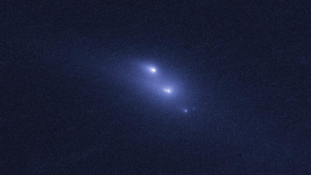 Though fragile comet nuclei have been seen falling apart as they near the Sun, nothing like the slow breakup of an asteroid has ever before been observed in the asteroid belt. A series of Hubble Space Telescope images shows that the fragments are drifting away from each other at a leisurely one mile per hour. This makes it unlikely that the asteroid is disintegrating because of a collision with another asteroid. A plausible explanation is that the asteroid is crumbling due to a subtle effect of sunlight. This causes the rotation rate to slowly increase until centrifugal force pulls the asteroid apart. The asteroid's remnant debris, weighing in at 200,000 tons, will in the future provide a rich source of meteoroids.  Hubble Observation of P/2013 R3 - November 15, 2013  Credit: NASA, ESA, and D. Jewitt (University of California, Los Angeles)   Read more: <a href="http://1.usa.gov/1ig2E0x" rel="nofollow">1.usa.gov/1ig2E0x</a>  <b><a href="http://www.nasa.gov/audience/formedia/features/MP_Photo_Guidelines.html" rel="nofollow">NASA image use policy.</a></b>   <b><a href="http://www.nasa.gov/centers/goddard/home/index.html" rel="nofollow">NASA Goddard Space Flight Center</a></b> enables NASA’s mission through four scientific endeavors: Earth Science, Heliophysics, Solar System Exploration, and Astrophysics. Goddard plays a leading role in NASA’s accomplishments by contributing compelling scientific knowledge to advance the Agency’s mission.   <b>Follow us on <a href="http://twitter.com/NASAGoddardPix" rel="nofollow">Twitter</a></b>   <b>Like us on <a href="http://www.facebook.com/pages/Greenbelt-MD/NASA-Goddard/395013845897?ref=tsd" rel="nofollow">Facebook</a></b>   <b>Find us on <a href="http://instagram.com/nasagoddard?vm=grid" rel="nofollow">Instagram</a></b>