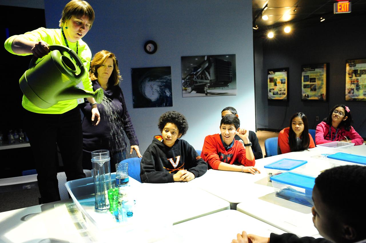 Children at the visitor center at NASA's Goddard Space Flight Center in Greenbelt, Md., receive a rainfall demonstration as part of activities tied to the launch of the Global Precipitation Measurement mission's Core Observatory on Feb. 27, 2014.  <b>Credit: NASA's Goddard Space Flight Center/Debbie McCallum</b>  GPM's Core Observatory is poised for launch from the Japan Aerospace Exploration Agency's Tanegashima Space Center, scheduled for the afternoon of Feb. 27, 2014 (EST).  GPM is a joint venture between NASA and the Japan Aerospace Exploration Agency. The GPM Core Observatory will link data from a constellation of current and planned satellites to produce next-generation global measurements of rainfall and snowfall from space.  The GPM mission is the first coordinated international satellite network to provide near real-time observations of rain and snow every three hours anywhere on the globe. The GPM Core Observatory anchors this network by providing observations on all types of precipitation. The observatory's data acts as the measuring stick by which partner observations can be combined into a unified data set. The data will be used by scientists to study climate change, freshwater resources, floods and droughts, and hurricane formation and tracking.  <b><a href="http://www.nasa.gov/audience/formedia/features/MP_Photo_Guidelines.html" rel="nofollow">NASA image use policy.</a></b>   <b><a href="http://www.nasa.gov/centers/goddard/home/index.html" rel="nofollow">NASA Goddard Space Flight Center</a></b> enables NASA’s mission through four scientific endeavors: Earth Science, Heliophysics, Solar System Exploration, and Astrophysics. Goddard plays a leading role in NASA’s accomplishments by contributing compelling scientific knowledge to advance the Agency’s mission.   <b>Follow us on <a href="http://twitter.com/NASAGoddardPix" rel="nofollow">Twitter</a></b>   <b>Like us on <a href="http://www.facebook.com/pages/Greenbelt-MD/NASA-Goddard/395013845897?ref=tsd" rel="nofollow">Facebook</a></b>   <b>Find us on <a href="http://instagram.com/nasagoddard?vm=grid" rel="nofollow">Instagram</a></b>