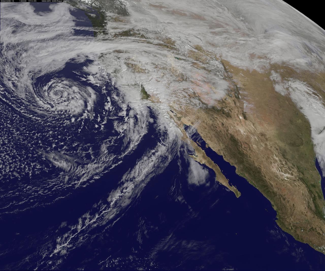 A swirling Eastern Pacific Ocean storm system headed for California was spotted by NOAA's GOES-West satellite on February 28. According to the National Weather Service, this storm system has the potential to bring heavy rainfall to the drought-stricken state.  The storm was captured using visible data from NOAA's GOES-West or GOES-15 satellite on Feb. 28 at 1915 UTC/11:15 a.m. PST was made into an image by NASA/NOAA's GOES Project at NASA's Goddard Space Flight Center in Greenbelt, Md. The storm's center appeared as a tight swirl, with bands of clouds and showers already sweeping over the state extending from northern California to Baja California, Mexico.  At 11:30 a.m. PST on February 28, Bill Patzert, climatologist at NASA's Jet Propulsion Laboratory in Pasadena, Calif. said, &quot;Right now from northern to southern California we are being battered by very heavy rain, strong winds and our coastal communities are being battered by high surf. Through the weekend we are bracing for mud and rock slides in areas that recently burned [from wildfires]. Flooding is looming up and down the state.&quot;  The National Weather Service (NWS) serving Los Angeles posted a Flood Watch for the region on Friday, February 28. The Flood Watch notes the &quot;potential for flash flooding and debris flows for some 2013 and 2014 burn areas in Los Angeles County from this morning through Saturday evening (March 1).”  The NWS Flood Watch also noted &quot;a very strong and dynamic storm will bring a significant amount of rain to much of southwestern California through Saturday evening. A flash flood watch has been issued for several recent burn areas in Los Angeles County due to the abundant rainfall expected. Rain rates at times are expected to range from a half inch to one inch per hour which could cause significant mud and debris flows. There will be a chance of thunderstorms with locally higher rainfall rates.&quot;  &quot;Californians haven't seen rain and wind this powerful in 3 years,&quot; Patzert said. &quot;By early next week, as this system moves east, this powerful system will wreak havoc causing snow and ice storms through the Midwest into the Northeast.&quot;  GOES satellites provide the kind of continuous monitoring necessary for intensive data analysis. Geostationary describes an orbit in which a satellite is always in the same position with respect to the rotating Earth. This allows GOES to hover continuously over one position on Earth's surface, appearing stationary. As a result, GOES provide a constant vigil for the atmospheric &quot;triggers&quot; for severe weather conditions such as tornadoes, flash floods, hail storms and hurricanes.  On a positive note, Patzert noted, &quot;This is a nice down payment on drought recovery in the parched Western U.S.&quot;  For updated information about the storm system, visit NOAA's National Weather Service website:  <a href="http://www.weather.gov" rel="nofollow">www.weather.gov</a>  For more information about GOES satellites, visit: <a href="http://www.goes.noaa.gov/" rel="nofollow">www.goes.noaa.gov/</a> or <a href="http://goes.gsfc.nasa.gov/" rel="nofollow">goes.gsfc.nasa.gov/</a>  Rob Gutro NASA's Goddard Space Flight Center  <b><a href="http://www.nasa.gov/audience/formedia/features/MP_Photo_Guidelines.html" rel="nofollow">NASA image use policy.</a></b>  <b><a href="http://www.nasa.gov/centers/goddard/home/index.html" rel="nofollow">NASA Goddard Space Flight Center</a></b> enables NASA’s mission through four scientific endeavors: Earth Science, Heliophysics, Solar System Exploration, and Astrophysics. Goddard plays a leading role in NASA’s accomplishments by contributing compelling scientific knowledge to advance the Agency’s mission.  <b>Follow us on <a href="http://twitter.com/NASAGoddardPix" rel="nofollow">Twitter</a></b>  <b>Like us on <a href="http://www.facebook.com/pages/Greenbelt-MD/NASA-Goddard/395013845897?ref=tsd" rel="nofollow">Facebook</a></b>  <b>Find us on <a href="http://instagram.com/nasagoddard?vm=grid" rel="nofollow">Instagram</a></b> 