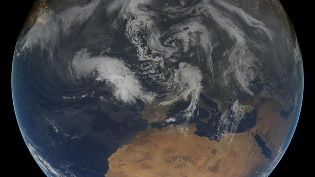 This composite image shows the weather situation over Europe at 12:00 UTC on 13 February 2014. The image is composed of infra-red imagery from the geostationary satellites of EUMETSAT and NOAA, overlaid on NASA's Blue Marble land imagery. Copyright: 2014 EUMETSAT, <a href="http://www.flickr.com/photos/eumetsat/12500210655">www.flickr.com/photos/eumetsat/12500210655</a>