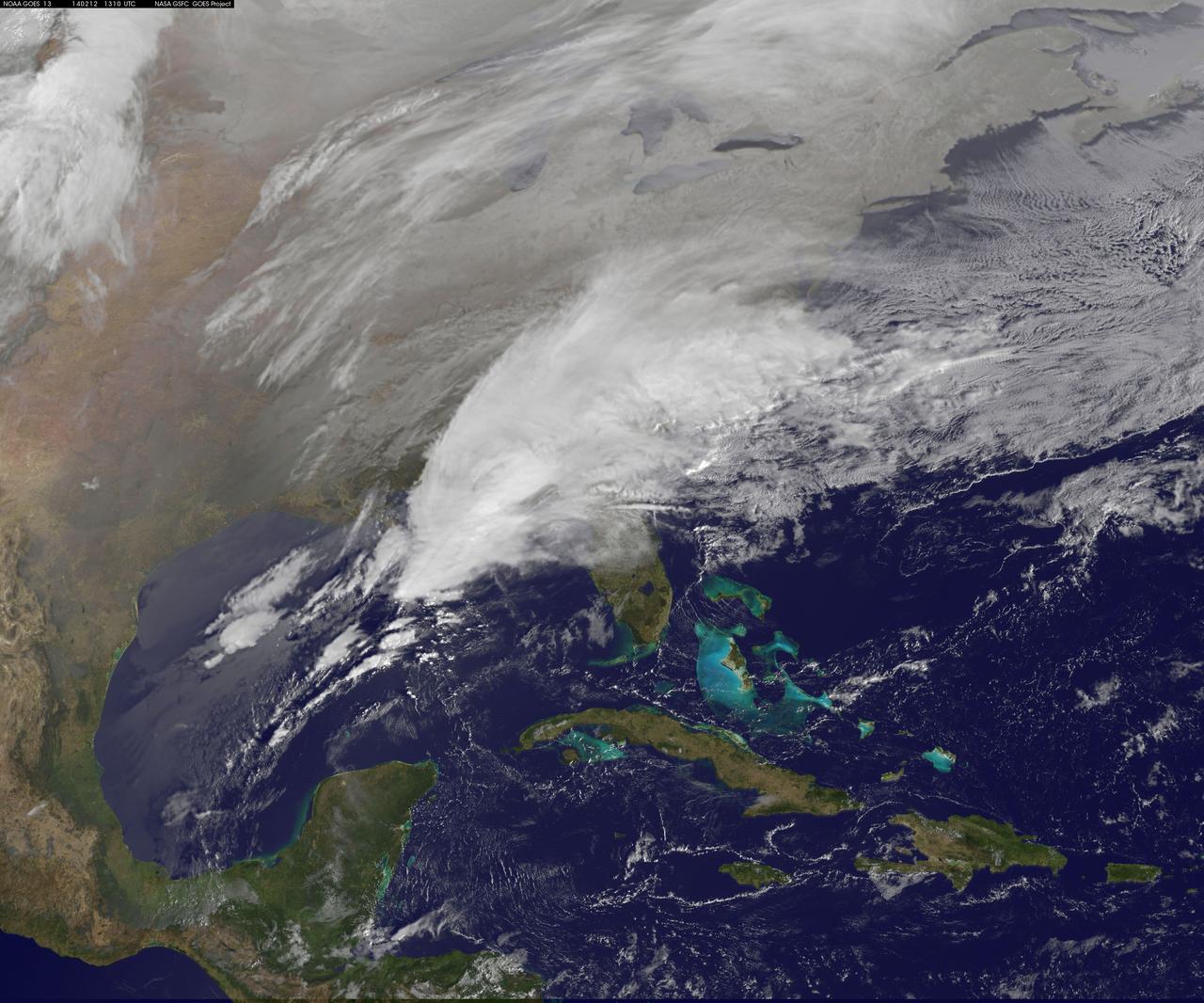 Clouds associated with the major winter storm that is bringing wintry precipitation and chilly temperatures to the U.S. south is the focus in an image from NOAA's GOES-East satellite today, February 12 at 1310 UTC/ 8:10 EST.  Rain, freezing rain, sleet and snow are part of the large front that stretches from eastern Texas to the Carolinas in the Geostationary Operational Environmental satellite or GOES image. NOAA's weather maps show several areas of low pressure along the frontal boundary. One low pressure is in the northern Gulf of Mexico, while the other is in the Atlantic Ocean, just south of South Carolina. (Insert link: <a href="http://www.hpc.ncep.noaa.gov/noaa/noaad1.gif" rel="nofollow">www.hpc.ncep.noaa.gov/noaa/noaad1.gif</a>).  NOAA's National Weather Service has been issuing watches and warnings throughout the south that extend along Mid-Atlantic east coast.  The visible cloud and ground snow data in this image was taken from NOAA's GOES-East satellite. The image was created by the NASA GOES Project at NASA's Goddard Space Flight Center in Greenbelt, Md. The clouds and fallen snow were overlaid on a true-color image of land and ocean created by data from the Moderate Resolution Imaging Spectroradiometer or MODIS instrument that flies aboard NASA's Aqua and Terra satellites.  NOAA's Weather Prediction Center, or WPC noted on Feb. 11 at 3:59 a.m. EST, &quot;Once the intensifying surface low moves off the Southeast coast and begins its track up the Eastern Seaboard Wednesday night...winter weather will start lifting northward into the northern Mid-Atlantic states.&quot;  GOES satellites provide the kind of continuous monitoring necessary for intensive data analysis. Geostationary describes an orbit in which a satellite is always in the same position with respect to the rotating Earth. This allows GOES to hover continuously over one position on Earth's surface, appearing stationary. As a result, GOES provide a constant vigil for the atmospheric &quot;triggers&quot; for severe weather conditions such as tornadoes, flash floods, hail storms and hurricanes.  For updated information about the storm system, visit NOAA's WPC website;  <a href="http://www.hpc.ncep.noaa.gov/" rel="nofollow">www.hpc.ncep.noaa.gov/</a>  For more information about GOES satellites, visit:  <a href="http://www.goes.noaa.gov/" rel="nofollow">www.goes.noaa.gov/</a> or <a href="http://goes.gsfc.nasa.gov/" rel="nofollow">goes.gsfc.nasa.gov/</a>  Rob Gutro NASA's Goddard Space Flight Center  <b><a href="http://www.nasa.gov/audience/formedia/features/MP_Photo_Guidelines.html" rel="nofollow">NASA image use policy.</a></b>  <b><a href="http://www.nasa.gov/centers/goddard/home/index.html" rel="nofollow">NASA Goddard Space Flight Center</a></b> enables NASA’s mission through four scientific endeavors: Earth Science, Heliophysics, Solar System Exploration, and Astrophysics. Goddard plays a leading role in NASA’s accomplishments by contributing compelling scientific knowledge to advance the Agency’s mission.  <b>Follow us on <a href="http://twitter.com/NASAGoddardPix" rel="nofollow">Twitter</a></b>  <b>Like us on <a href="http://www.facebook.com/pages/Greenbelt-MD/NASA-Goddard/395013845897?ref=tsd" rel="nofollow">Facebook</a></b>  <b>Find us on <a href="http://instagram.com/nasagoddard?vm=grid" rel="nofollow">Instagram</a></b>