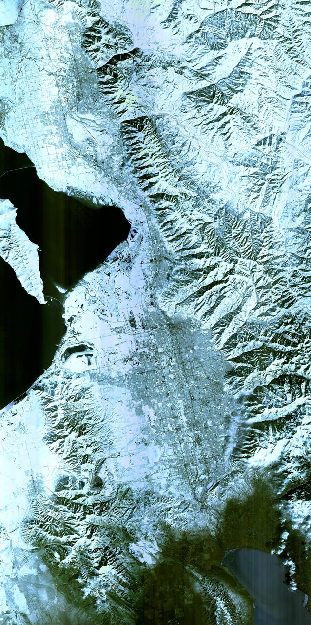 Salt Lake City, Utah, Winter 2001  The 2002 Winter Olympics are hosted by Salt Lake City at several venues within the city, in nearby cities, and within the adjacent Wasatch Mountains. This simulated natural color image presents a snowy, winter view of north central Utah that includes all of the Olympic sites. The image extends from Ogden in the north, to Provo in the south; and includes the snow-capped Wasatch Mountains and the eastern part of the Great Salt Lake. This image was acquired on February 8, 2001 by the Advanced Spaceborne Thermal Emission and Reflection Radiometer (ASTER) on NASA's Terra satellite. With its 14 spectral bands from the visible to the thermal infrared wavelength region, and its high spatial resolution of 15 to 90 meters (about 50 to 300 feet), ASTER will image Earth for the next 6 years to map and monitor the changing surface of our planet. ASTER is one of five Earth-observing instruments launched December 18,1999, on NASA's Terra satellite. The instrument was built by Japan's Ministry of Economy, Trade and Industry. A joint U.S./Japan science team is responsible for validation and calibration of the instrument and the data products. Dr. Anne Kahle at NASA's Jet Propulsion Laboratory, Pasadena, California, is the U.S. Science team leader; Bjorn Eng of JPL is the project manager. ASTER is the only high resolution imaging sensor on Terra. The Terra mission is part of NASA's Earth Science Enterprise, along-term research and technology program designed to examine Earth's land, oceans, atmosphere, ice and life as a total integrated system. The broad spectral coverage and high spectral resolution of ASTER will provide scientists in numerous disciplines with critical information for surface mapping, and monitoring dynamic conditions and temporal change. Example applications are: monitoring glacial advances and retreats; monitoring potentially active volcanoes; identifying crop stress; determining cloud morphology and physical properties; wetlands evaluation; thermal pollution monitoring; coral reef degradation; surface temperature mapping of soils and geology; and measuring surface heat balance.  Image credit: NASA/GSFC/METI/ERSDAC/JAROS, and U.S./Japan ASTER Science Team   Credit: <b><a href="http://www.earthobservatory.nasa.gov/" rel="nofollow"> NASA Earth Observatory</a></b>  <b><a href="http://www.nasa.gov/audience/formedia/features/MP_Photo_Guidelines.html" rel="nofollow">NASA image use policy.</a></b>  <b><a href="http://www.nasa.gov/centers/goddard/home/index.html" rel="nofollow">NASA Goddard Space Flight Center</a></b> enables NASA’s mission through four scientific endeavors: Earth Science, Heliophysics, Solar System Exploration, and Astrophysics. Goddard plays a leading role in NASA’s accomplishments by contributing compelling scientific knowledge to advance the Agency’s mission.  <b>Follow us on <a href="http://twitter.com/NASAGoddardPix" rel="nofollow">Twitter</a></b>  <b>Like us on <a href="http://www.facebook.com/pages/Greenbelt-MD/NASA-Goddard/395013845897?ref=tsd" rel="nofollow">Facebook</a></b>  <b>Find us on <a href="http://instagram.com/nasagoddard?vm=grid" rel="nofollow">Instagram</a></b>