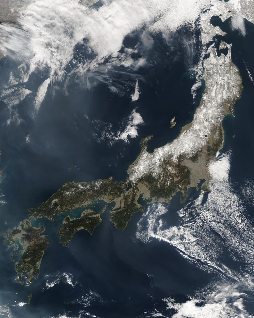 The Moderate Resolution Imaging Spectroradiometer (MODIS) on the Aqua satellite captured this stunning view of Japan’ four largest islands on February 20, 2004. The snow-covered southern arm of Hokkaido extends into the upper left corner. Honshu, Japan’s largest island, curves across the center of the image. Shikoku, right, and Kyushu, left, form the southern tip of the group. Japan is mostly mountainous, and, as the dusting of snow in this image shows, is cold in the north and more tropical in the south. A single red dot marks the location of an active fire.  Credit: Jeff Schmaltz, MODIS Rapid Response Team, NASA/GSFC  <b><a href="http://www.nasa.gov/audience/formedia/features/MP_Photo_Guidelines.html" rel="nofollow">NASA image use policy.</a></b>  <b><a href="http://www.nasa.gov/centers/goddard/home/index.html" rel="nofollow">NASA Goddard Space Flight Center</a></b> enables NASA’s mission through four scientific endeavors: Earth Science, Heliophysics, Solar System Exploration, and Astrophysics. Goddard plays a leading role in NASA’s accomplishments by contributing compelling scientific knowledge to advance the Agency’s mission.  <b>Follow us on <a href="http://twitter.com/NASAGoddardPix" rel="nofollow">Twitter</a></b>  <b>Like us on <a href="http://www.facebook.com/pages/Greenbelt-MD/NASA-Goddard/395013845897?ref=tsd" rel="nofollow">Facebook</a></b>  <b>Find us on <a href="http://instagram.com/nasagoddard?vm=grid" rel="nofollow">Instagram</a></b>